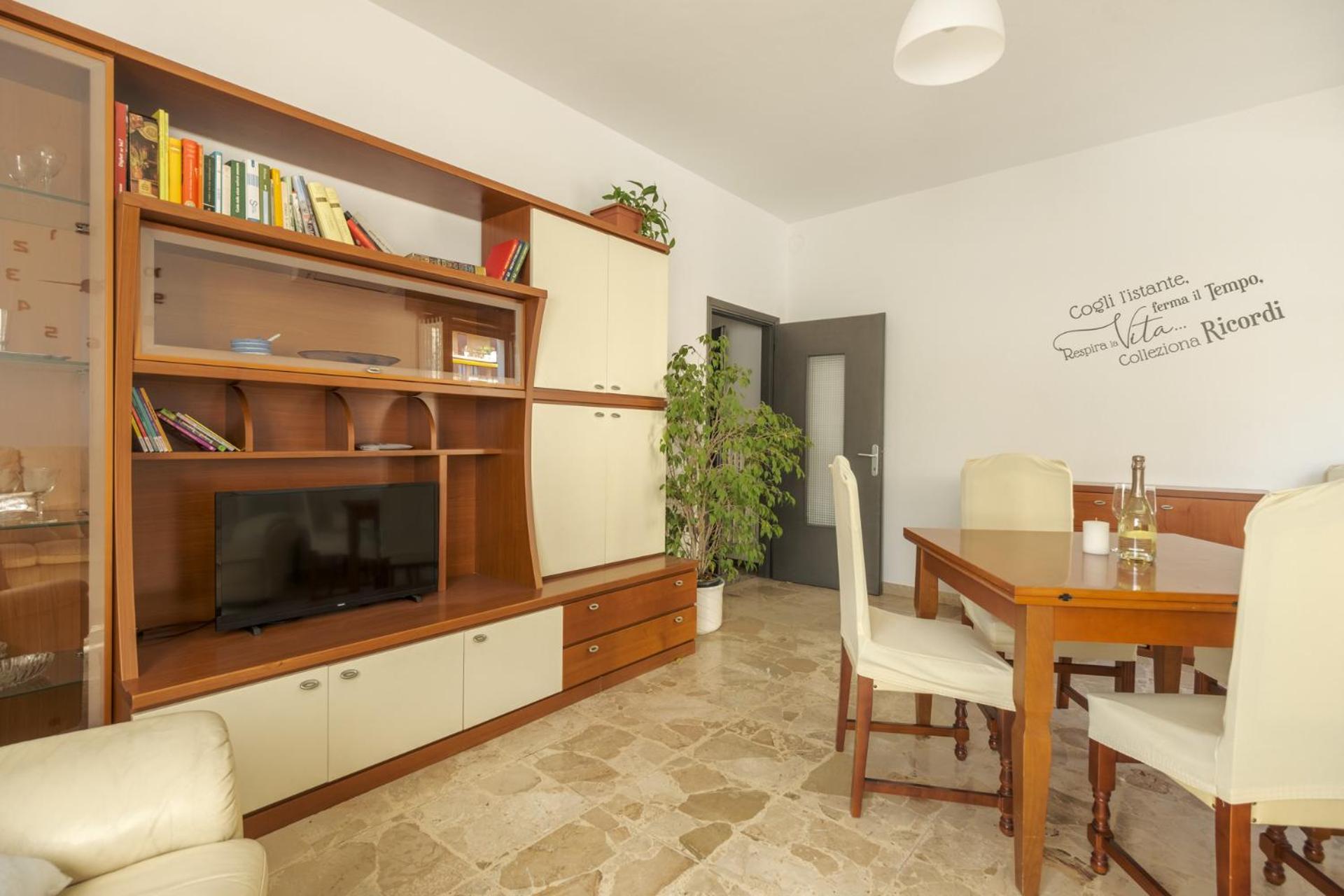 Three-Bedroom Apartment photo 1