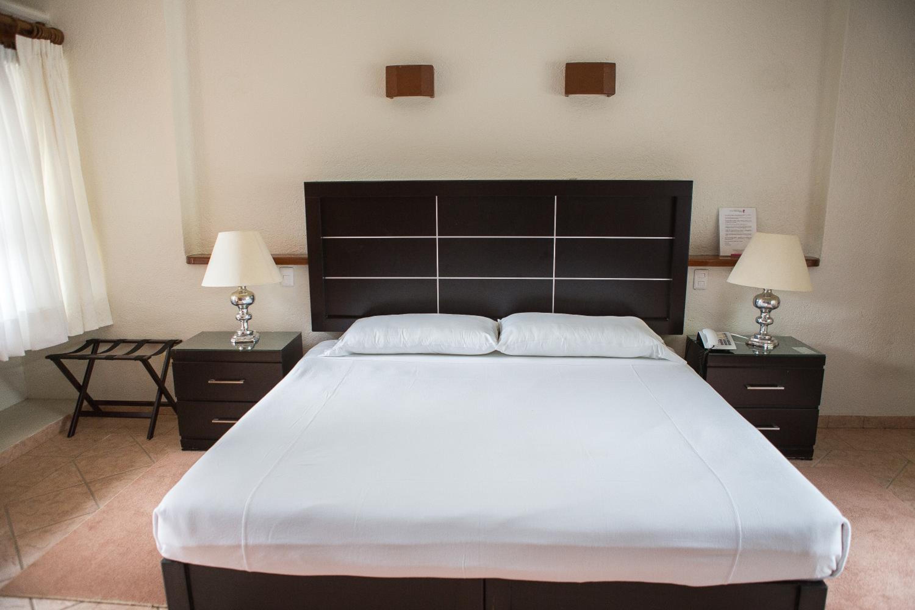 Deluxe Queen Room - Photo 4
