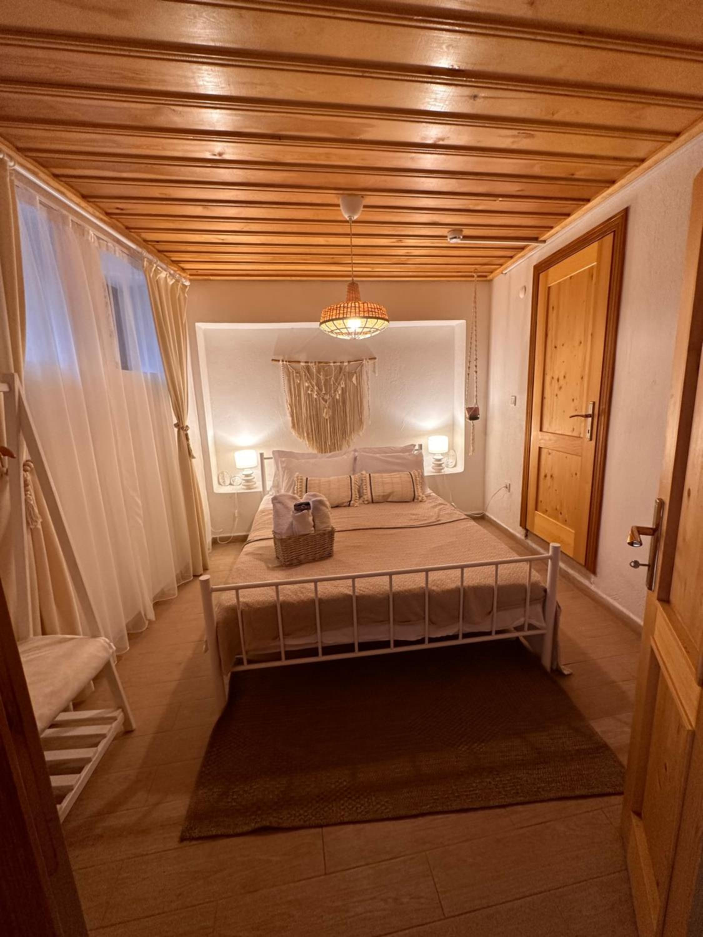 Quarto Queen com vista para o jardim
