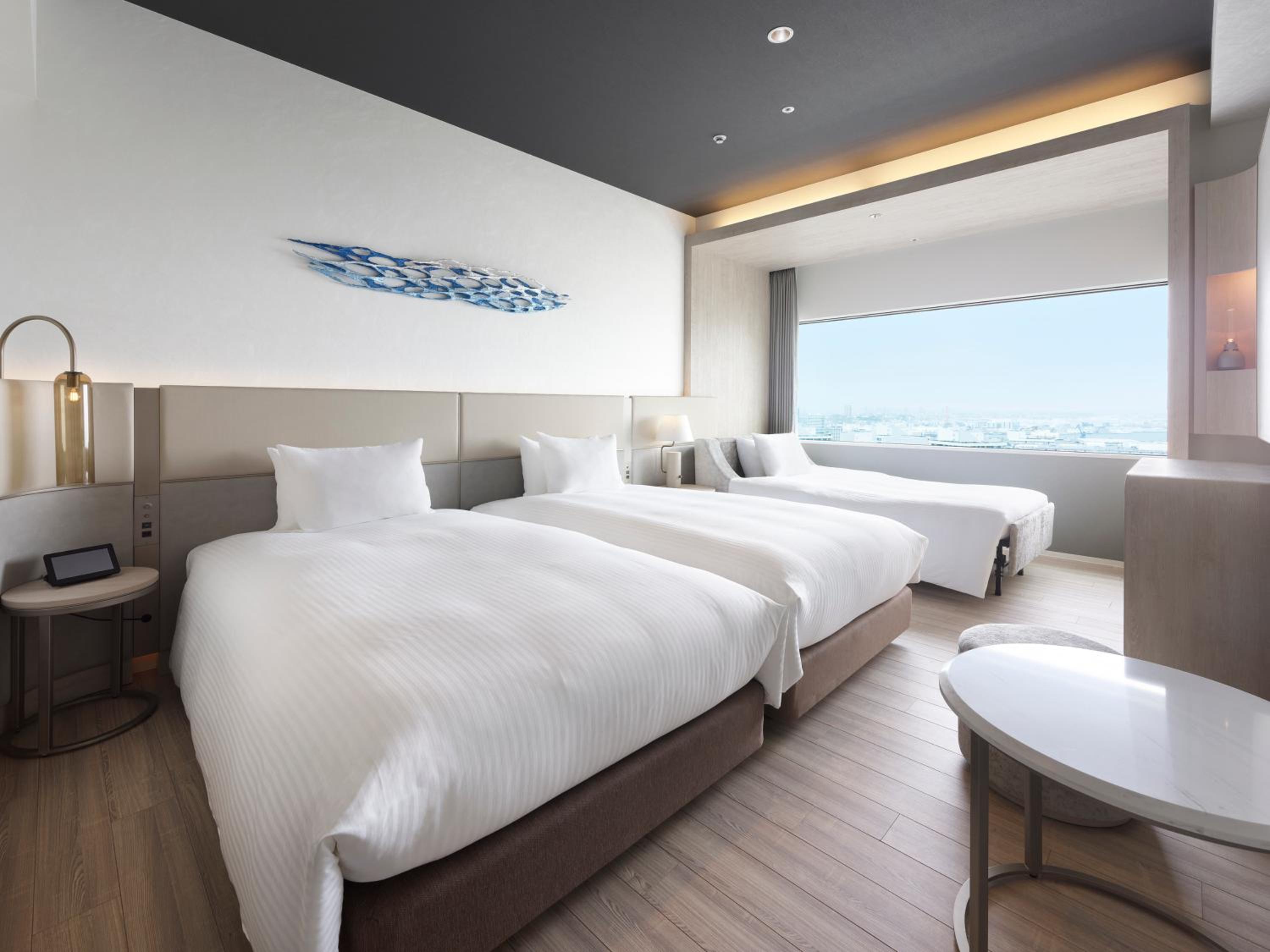 Deluxe Twin with Sofa Bed photo 1