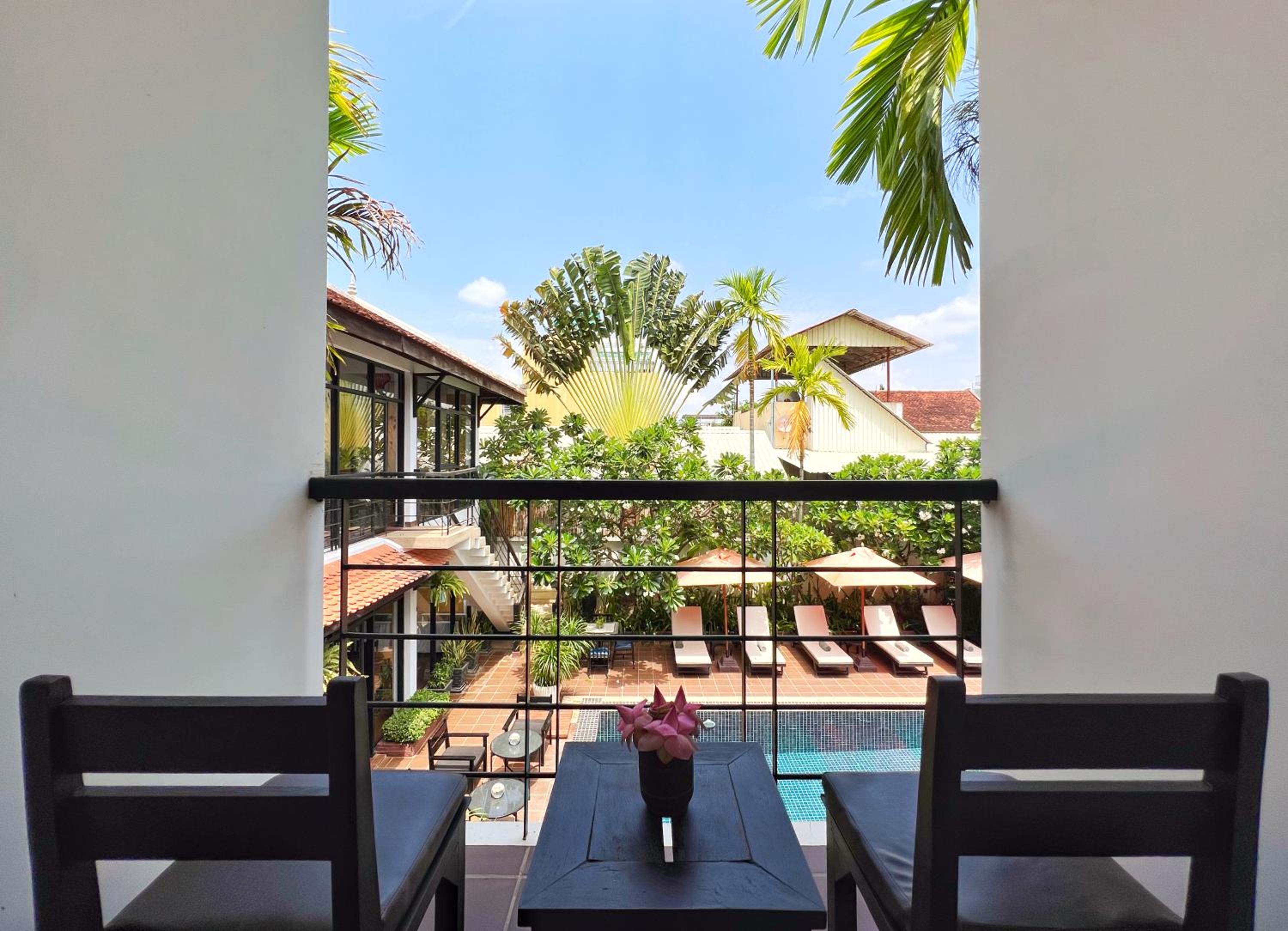 Deluxe Double Pool View with Balcony - Photo 8