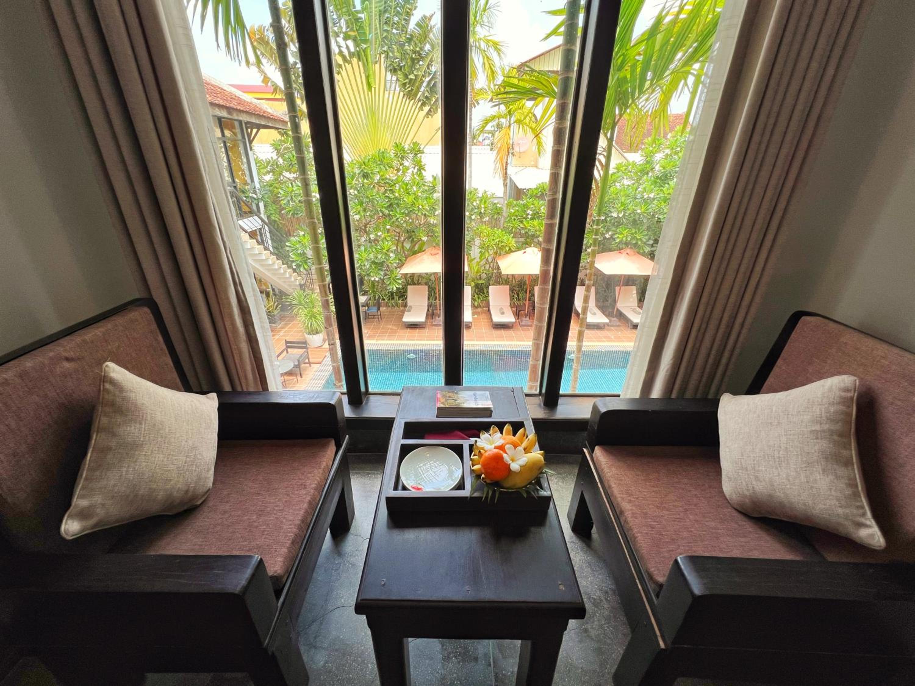Deluxe Double Pool View with Balcony - Photo 6