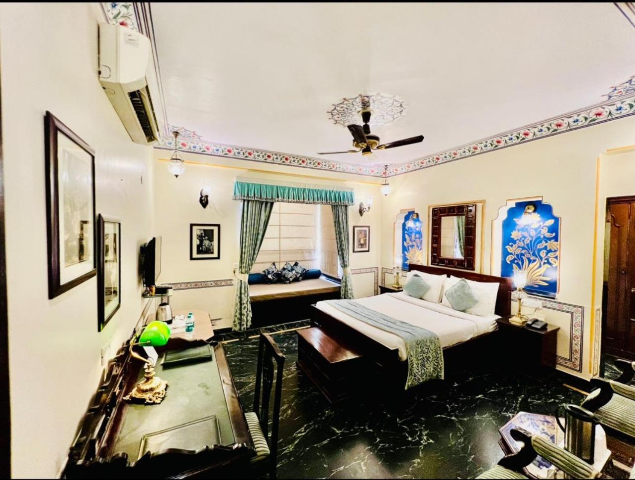 Royal Deluxe Room: Free pickup from train or bus station on arrival. Enjoy daily Rajasthani dance & music (7PM–9 PM), swimming pool, kids stay free, and a dedicated travel desk to assist with local sightseeing tours, intercity travel and activities - Photo 1
