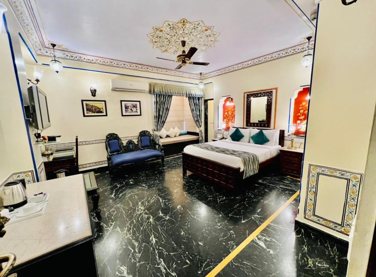 Royal Deluxe Room: Free pickup from train or bus station on arrival. Enjoy daily Rajasthani dance & music (7PM–9 PM), swimming pool, kids stay free, and a dedicated travel desk to assist with local sightseeing tours, intercity travel and activities - Photo 14