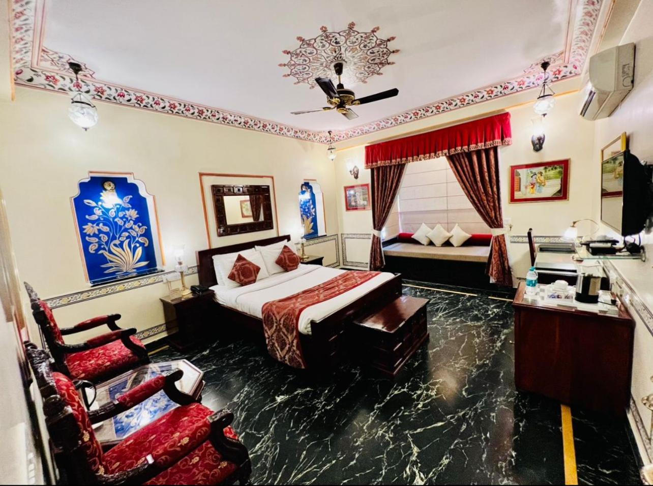 Royal Deluxe Room: Free pickup from train or bus station on arrival. Enjoy daily Rajasthani dance & music (7PM–9 PM), swimming pool, kids stay free, and a dedicated travel desk to assist with local sightseeing tours, intercity travel and activities - Photo 15