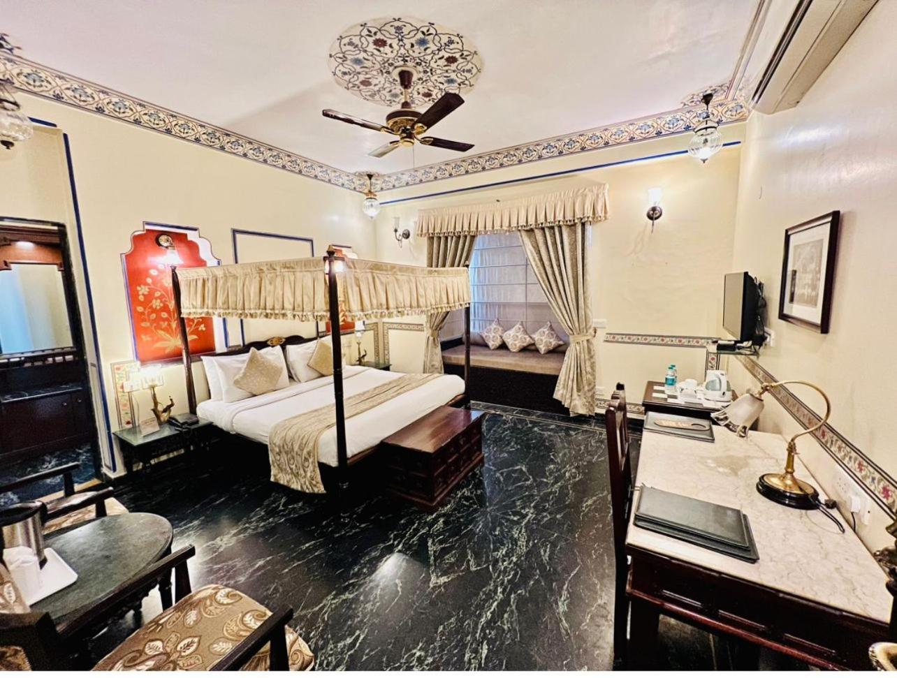 Royal Deluxe Room: Free pickup from train or bus station on arrival. Enjoy daily Rajasthani dance & music (7PM–9 PM), swimming pool, kids stay free, and a dedicated travel desk to assist with local sightseeing tours, intercity travel and activities - Photo 16