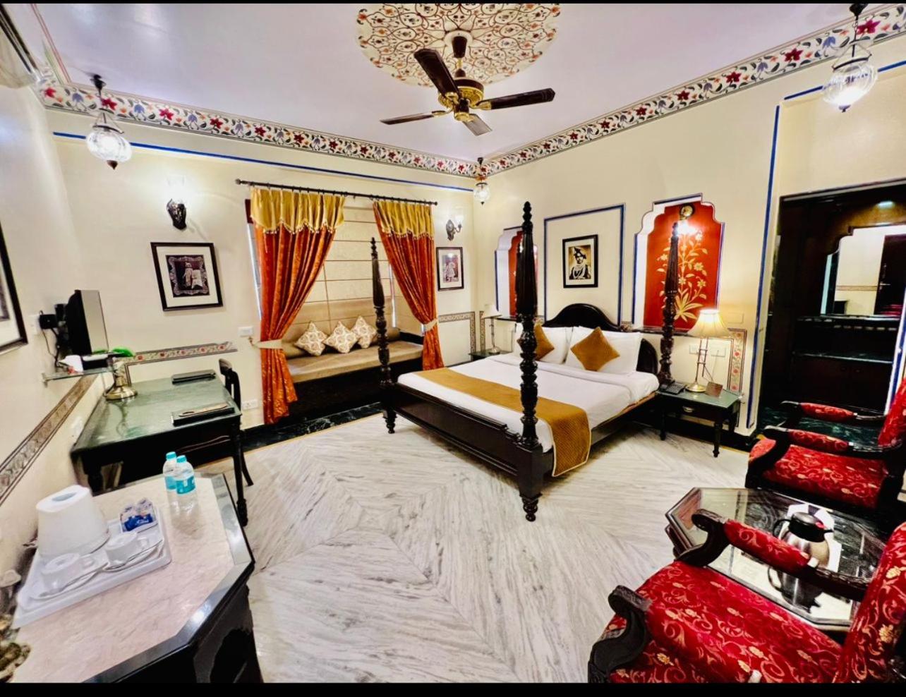 Royal Deluxe Room: Free pickup from train or bus station on arrival. Enjoy daily Rajasthani dance & music (7PM–9 PM), swimming pool, kids stay free, and a dedicated travel desk to assist with local sightseeing tours, intercity travel and activities - Photo 9