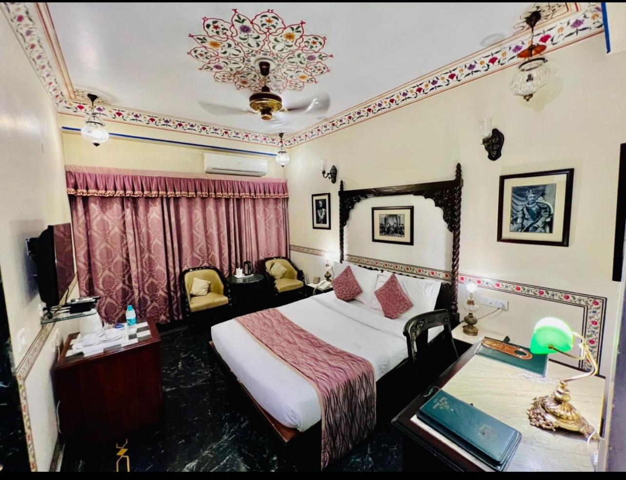 Royal Deluxe Room: Free pickup from train or bus station on arrival. Enjoy daily Rajasthani dance & music (7PM–9 PM), swimming pool, kids stay free, and a dedicated travel desk to assist with local sightseeing tours, intercity travel and activities - Photo 7