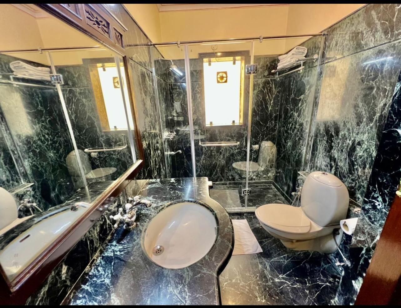 Royal Deluxe Room: Free pickup from train or bus station on arrival. Enjoy daily Rajasthani dance & music (7PM–9 PM), swimming pool, kids stay free, and a dedicated travel desk to assist with local sightseeing tours, intercity travel and activities - Photo 11