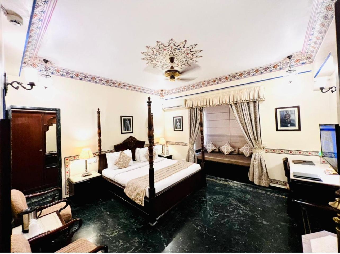 Royal Deluxe Room: Free pickup from train or bus station on arrival. Enjoy daily Rajasthani dance & music (7PM–9 PM), swimming pool, kids stay free, and a dedicated travel desk to assist with local sightseeing tours, intercity travel and activities - Photo 3