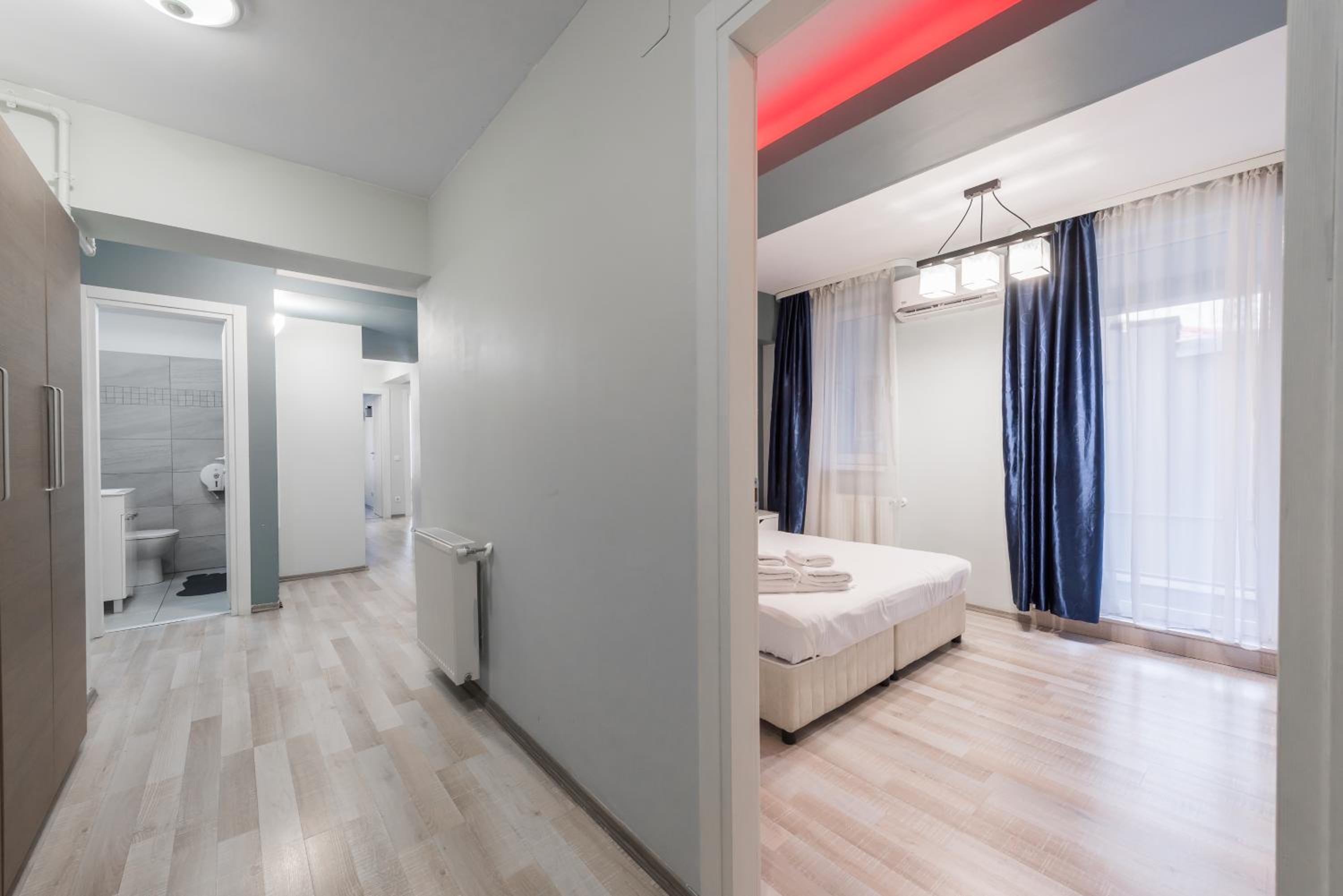 Three-Bedroom Apartment - Photo 13