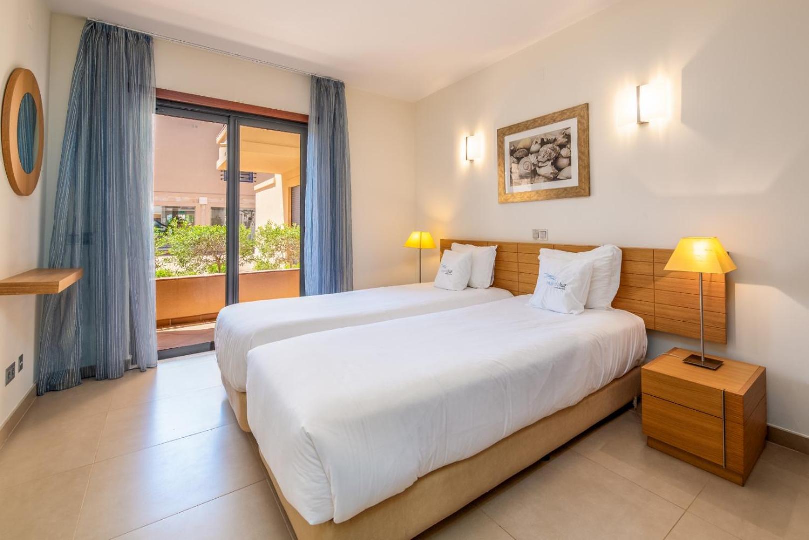 Three-Bedroom Apartment with Pool and Garden