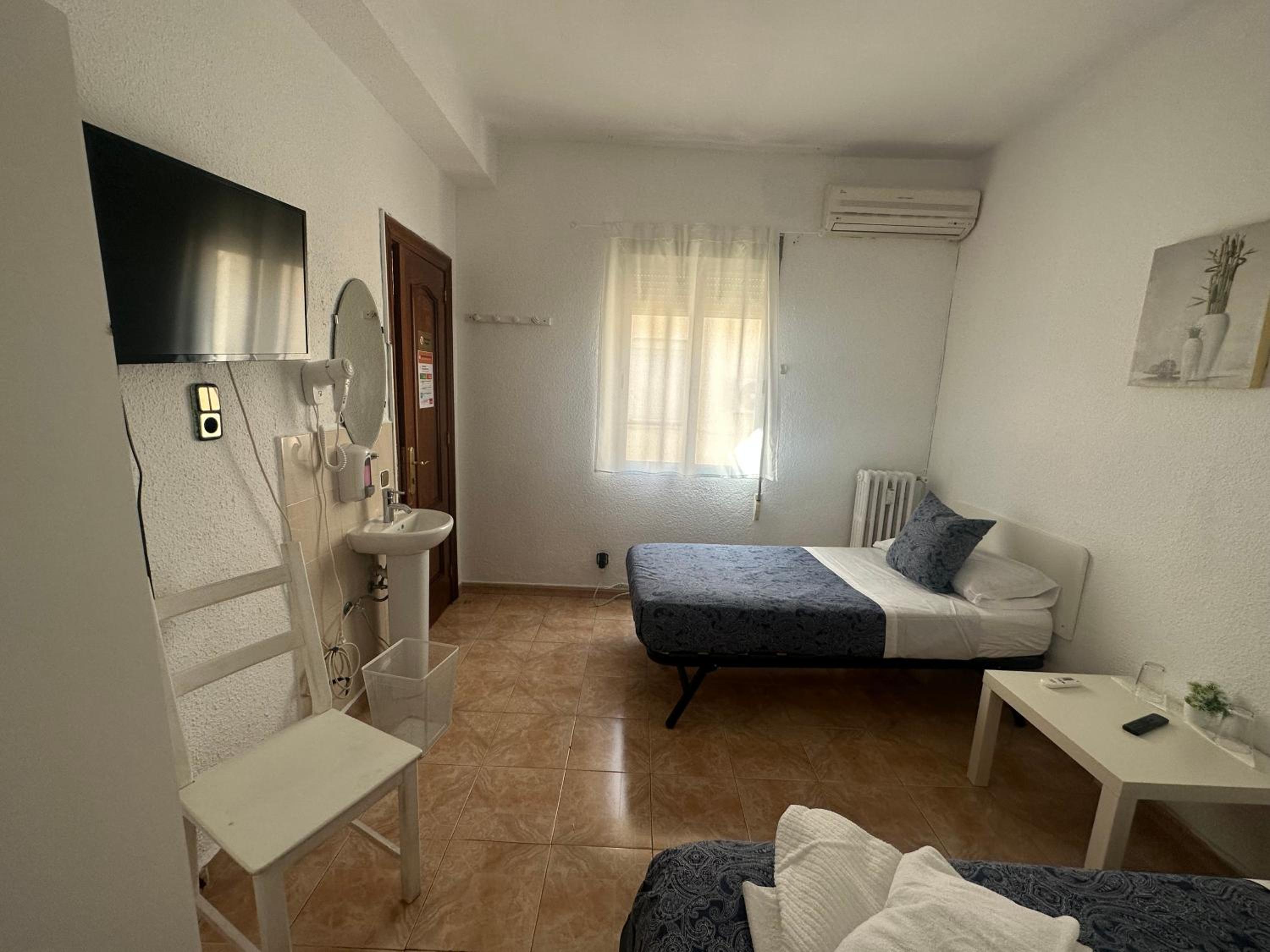 Habitación Doble con Baño Compartido
