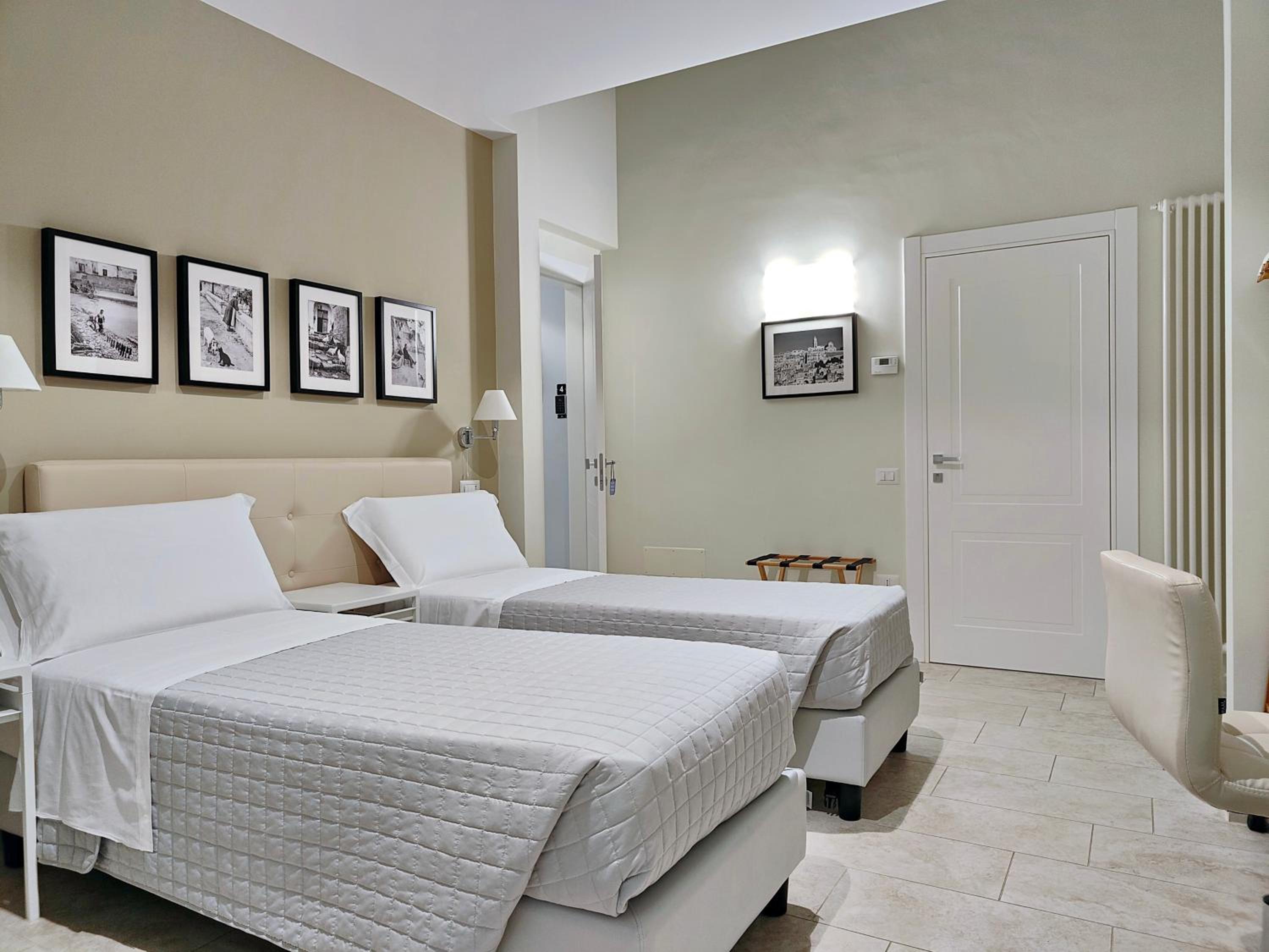 Deluxe Triple Room - Photo 10