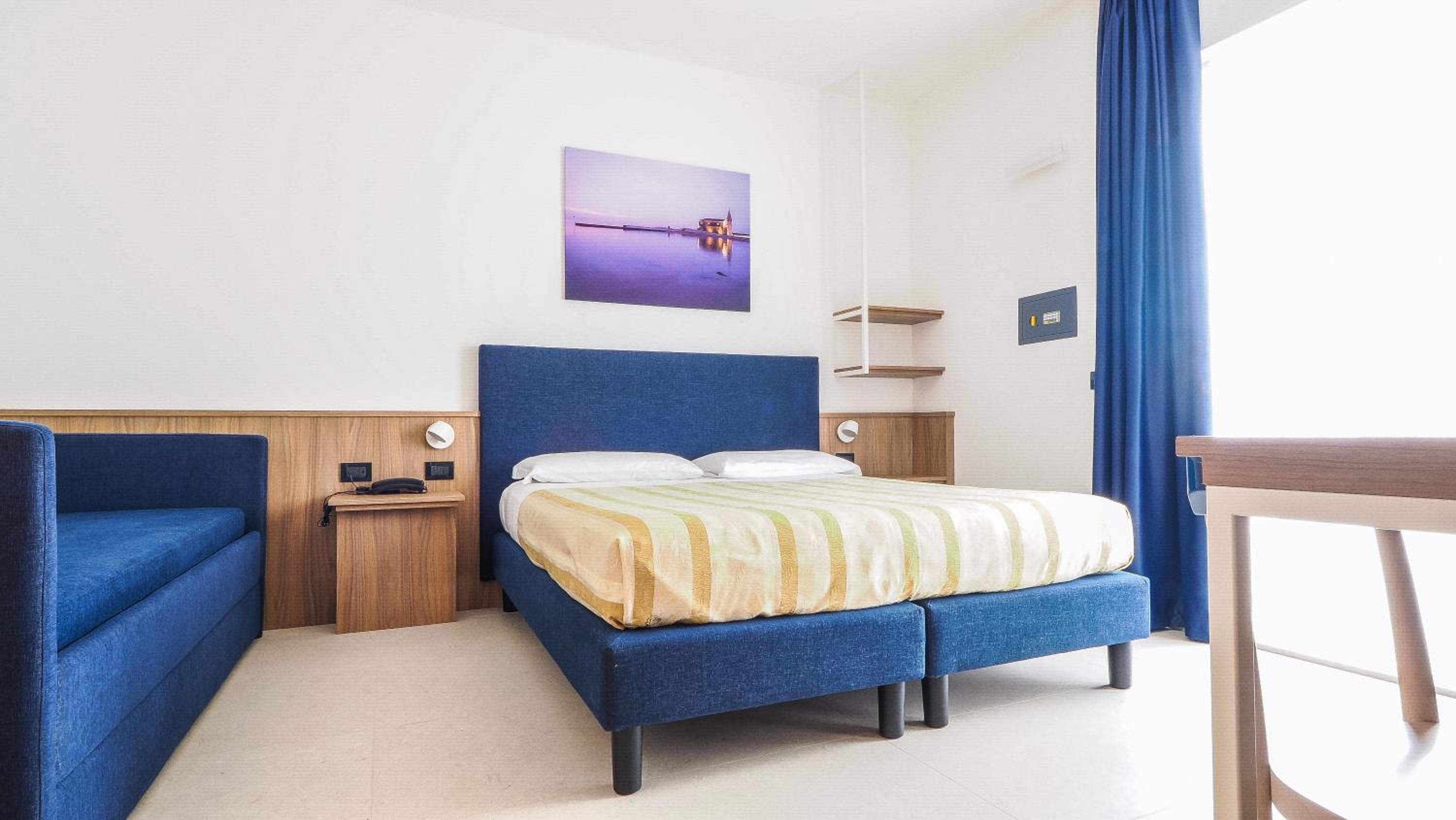 Quadruple Room with Balcony