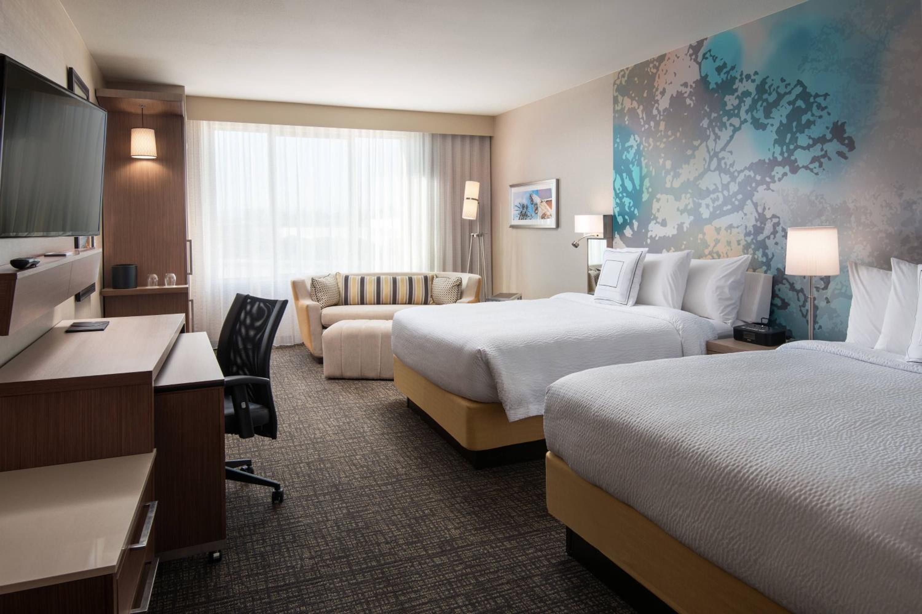 Deluxe Queen Room with Two Queen Beds - Pool View