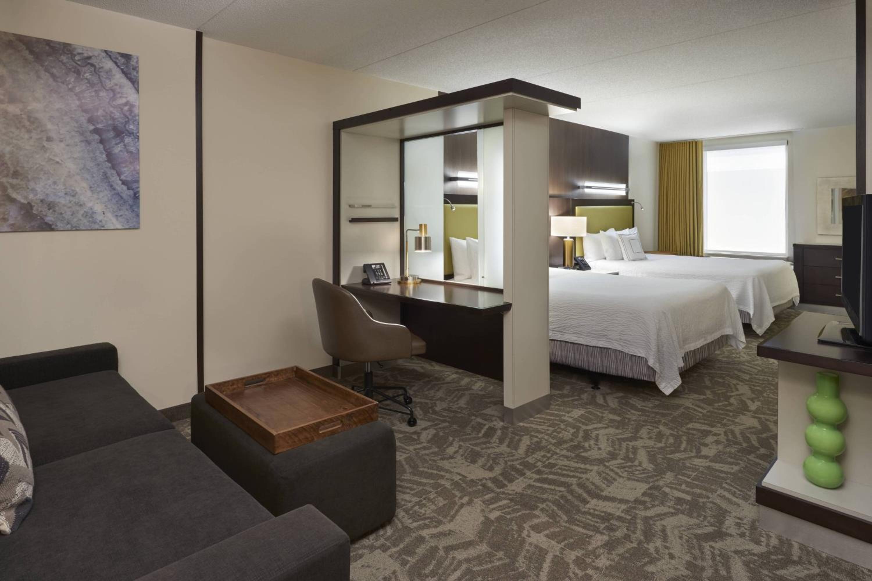 Queen Suite with Two Queen Beds and Trundle Sofa - Photo 1