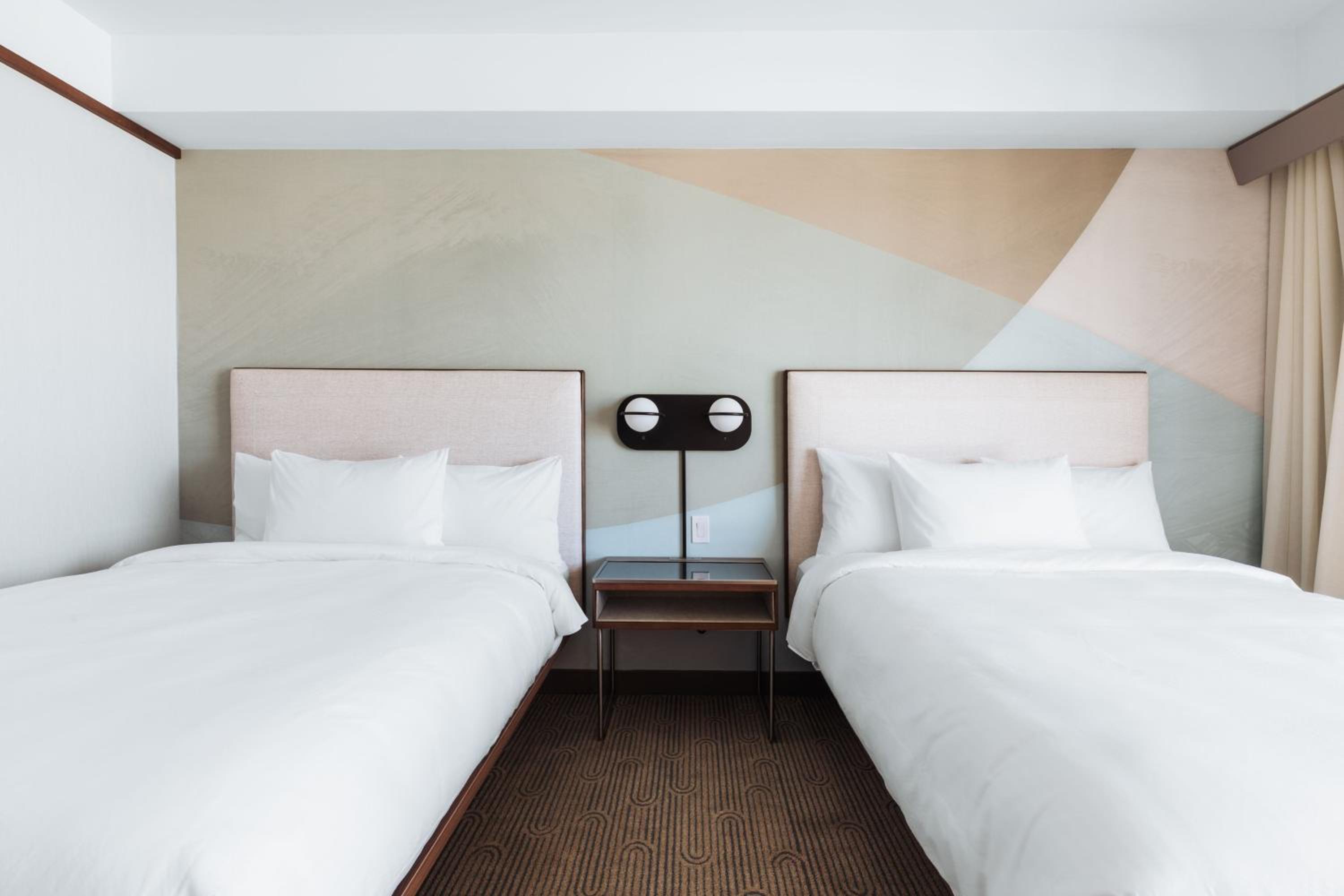 Queen Room with Two Queen Beds and City View - Photo 1