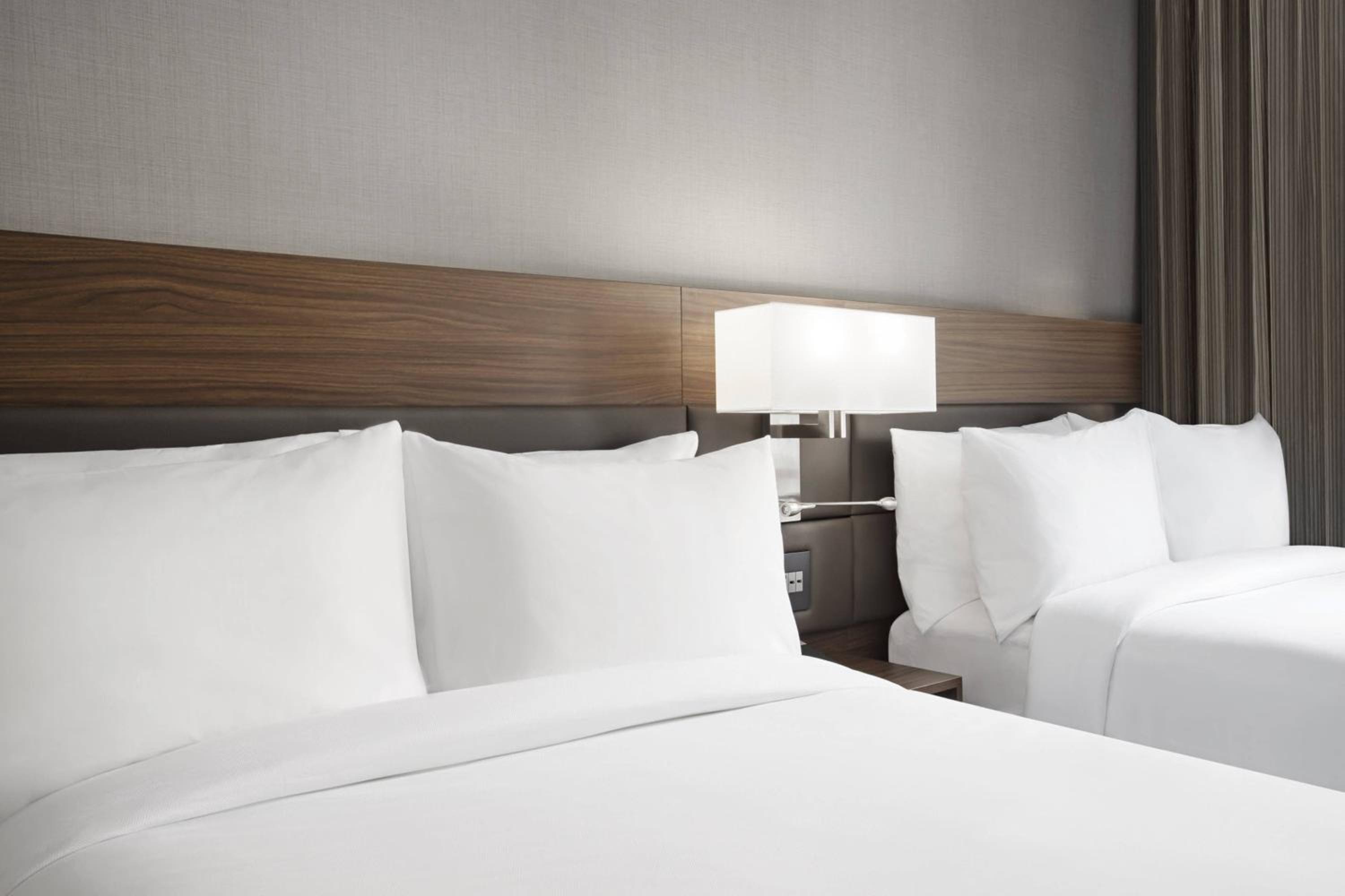 Queen Room with Two Queen Beds - Photo 1