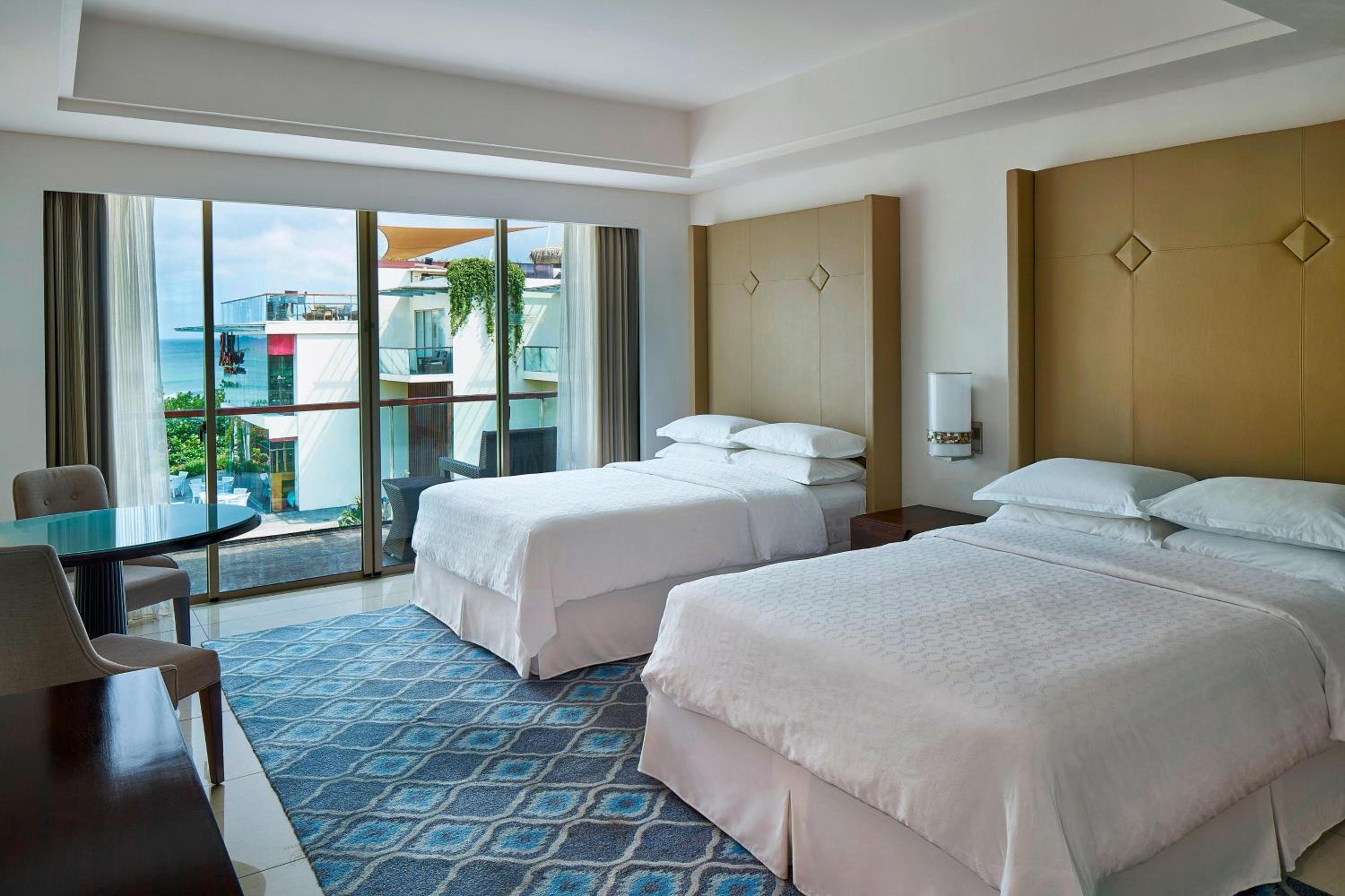 Guest Room Ocean View, 2 Double Beds (suitable for 2 adults & 2 children below 12 y.o. or 3 adults with Extra Bed ) photo 1