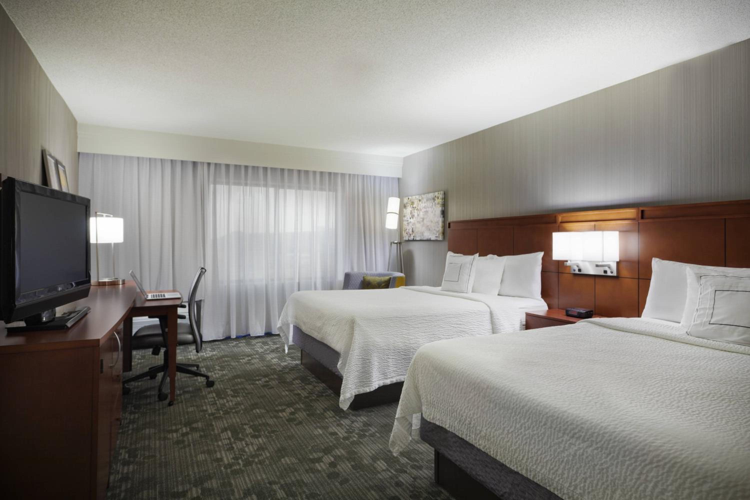 Queen Room with Two Queen Beds - Photo 1