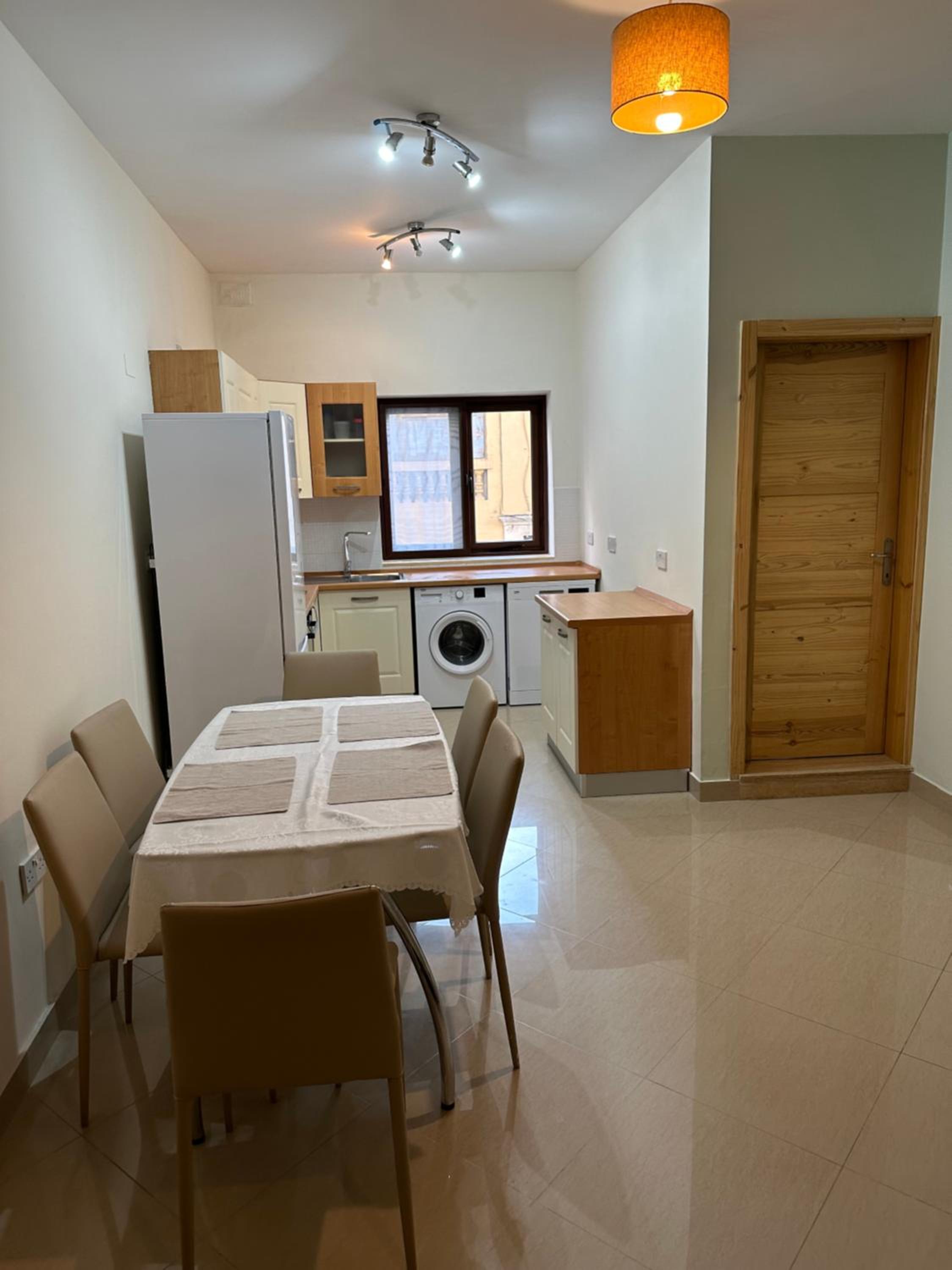 Three-Bedroom Apartment - Photo 6
