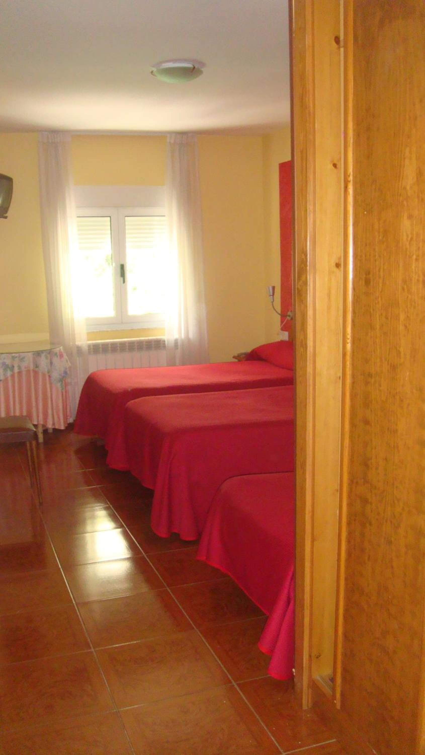 Habitación Triple con Baño Privado