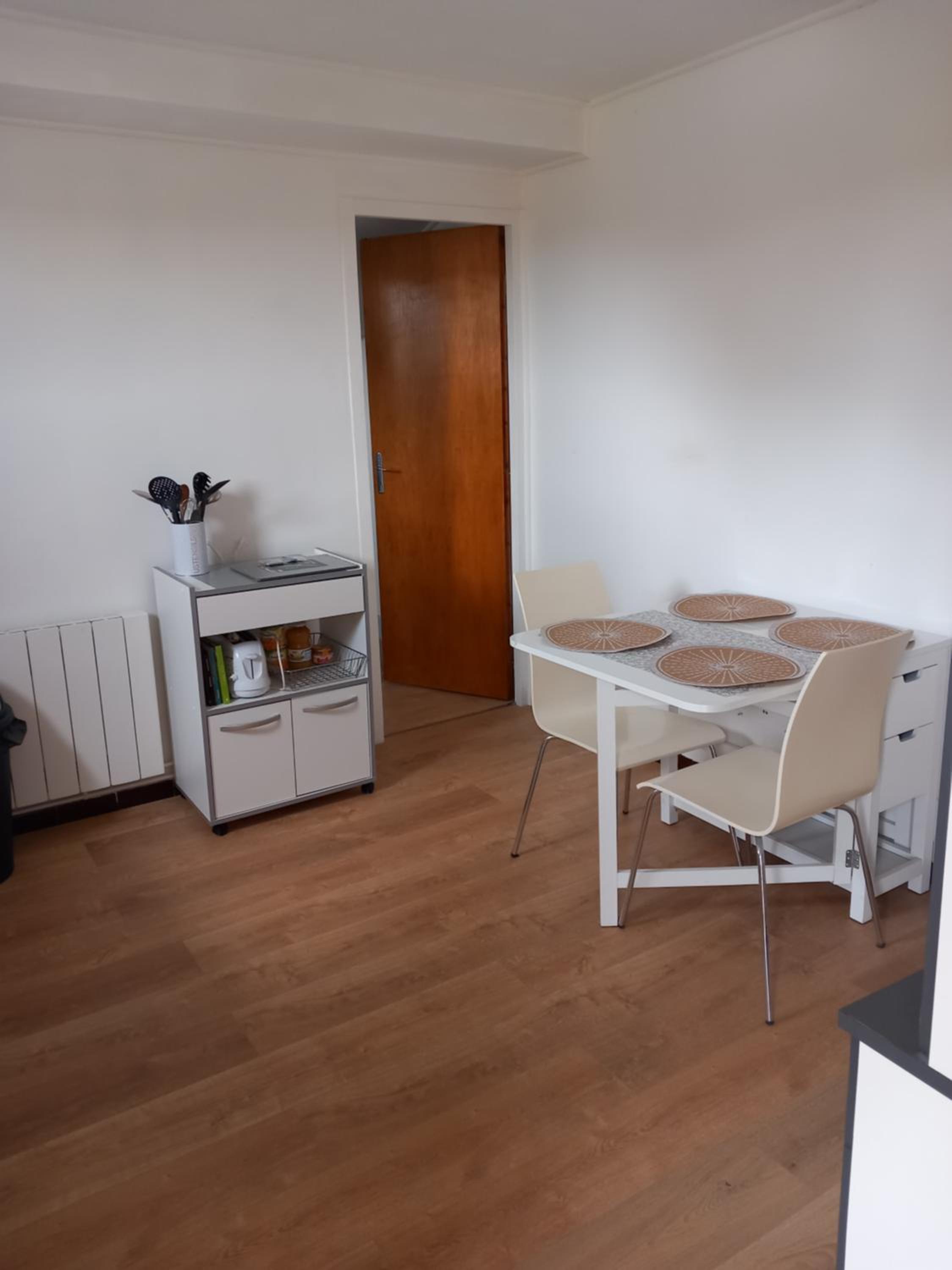 Three-Bedroom Apartment - Photo 11