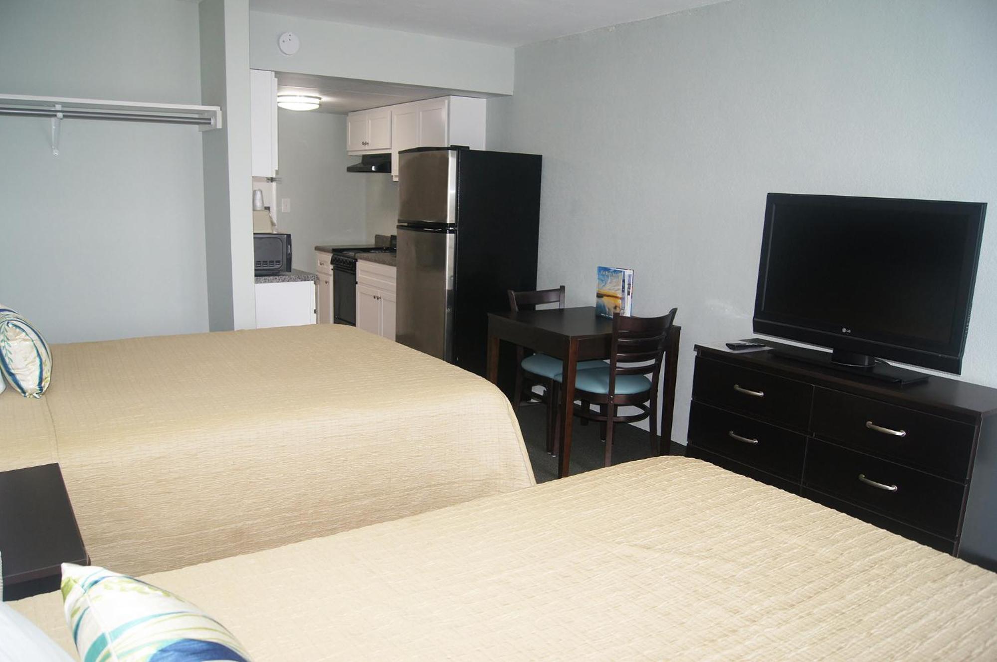 Queen Room with Two Queen Beds and Kitchenette-Oceanfront View - Photo 1