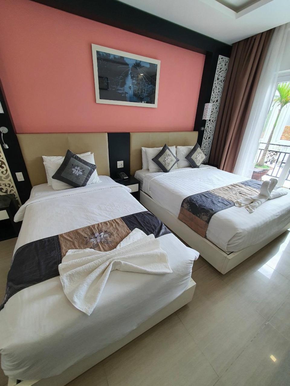 Deluxe Triple Room - Photo 12