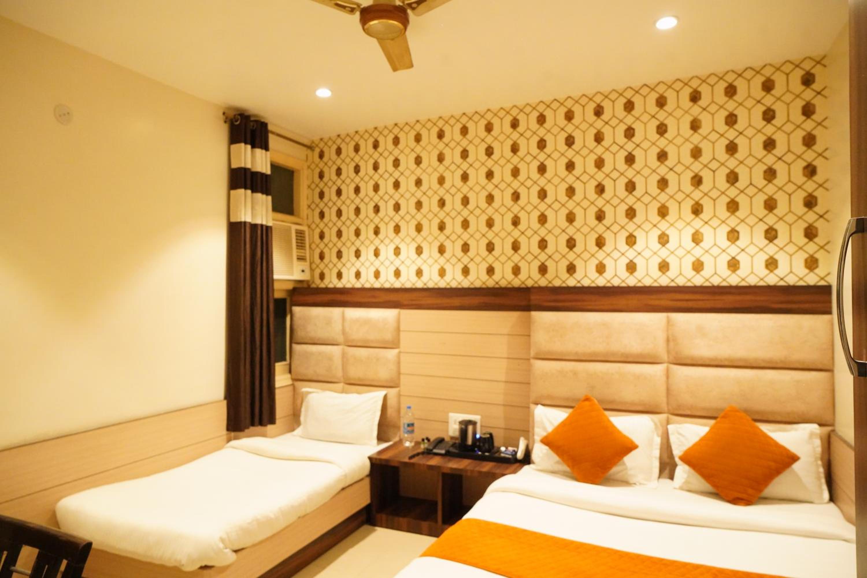 Deluxe Triple Room - Photo 19