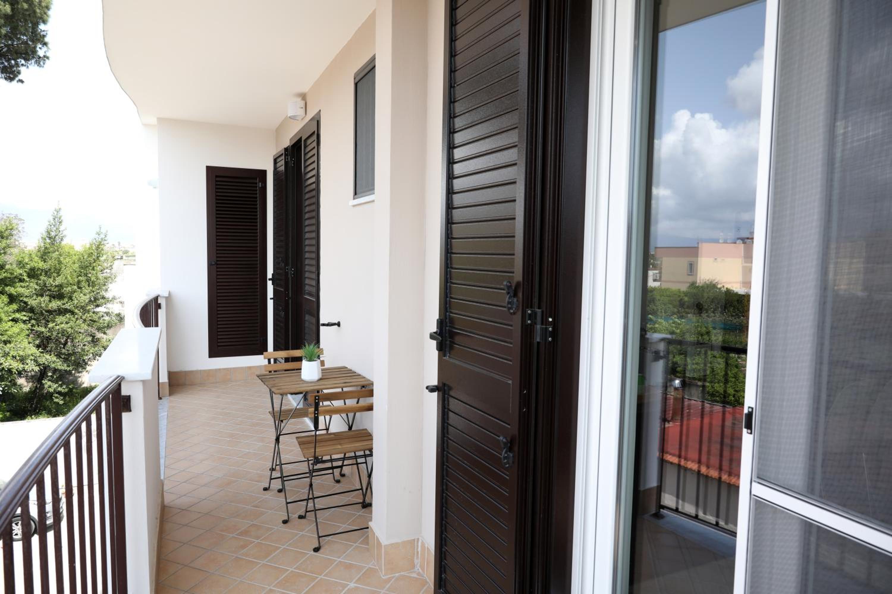 Apartment with Balcony - Photo 13