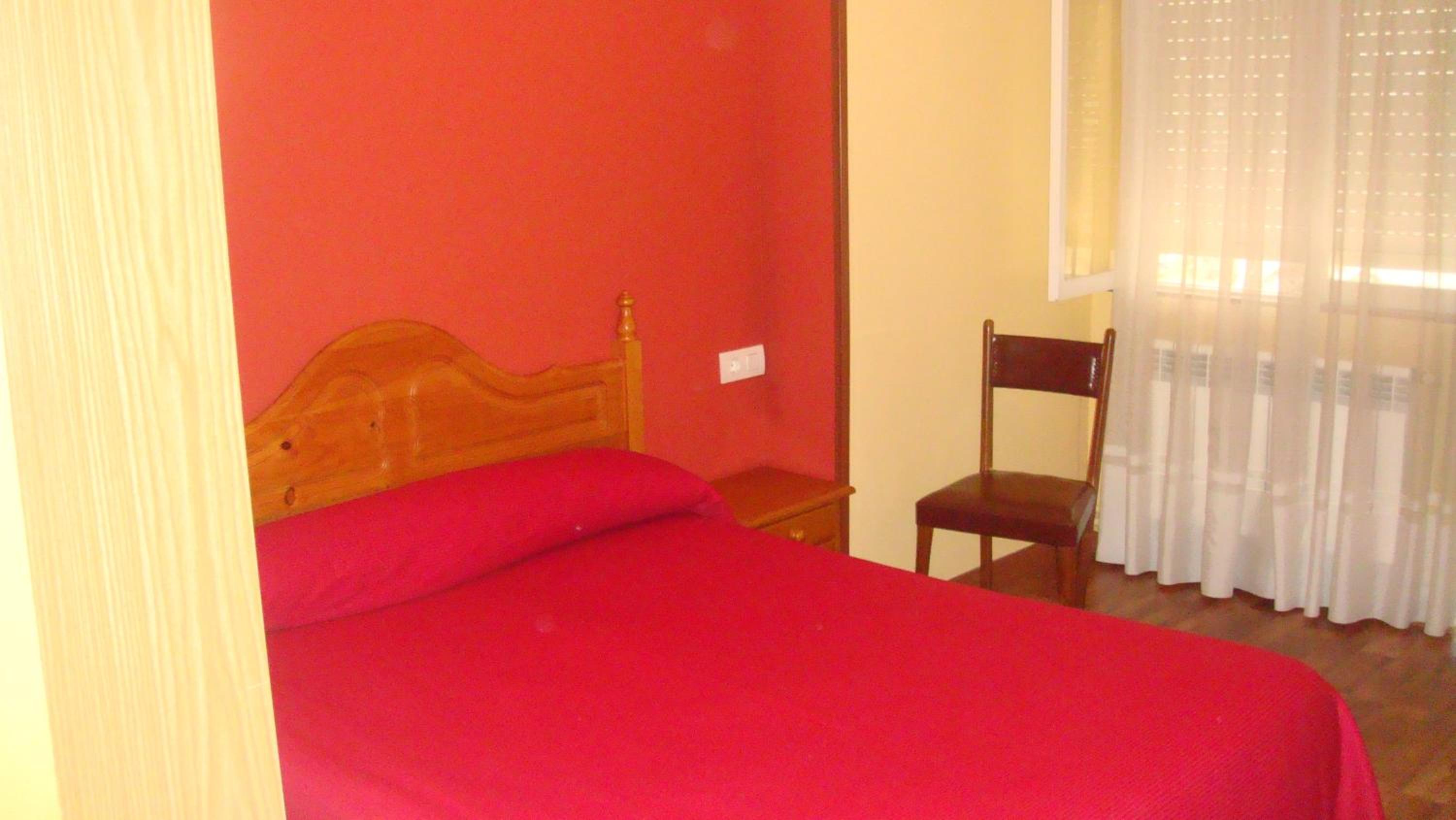 Habitación Queen con Baño Compartido
