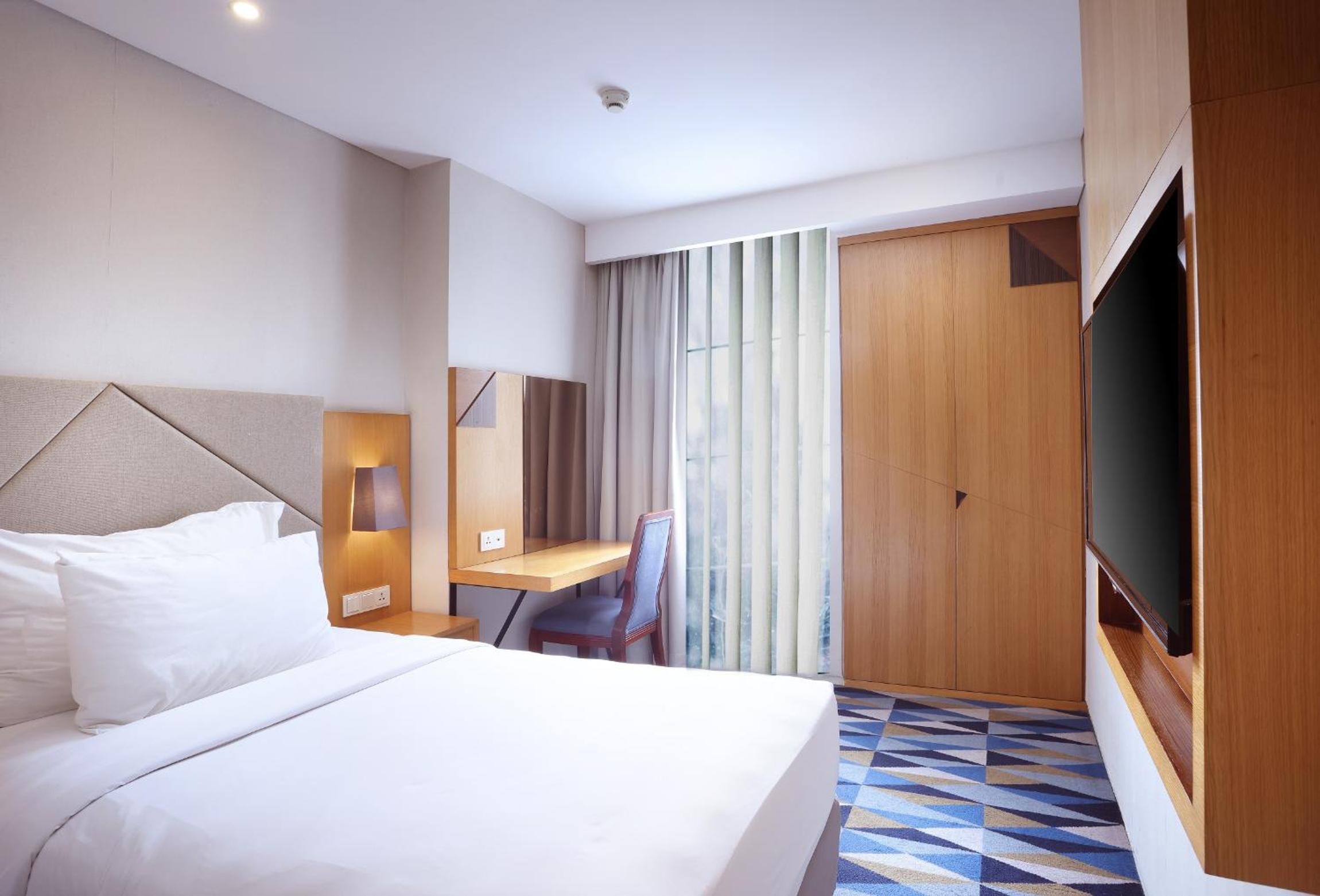 Two-Bedroom Family Suite with Queen and Single Beds
