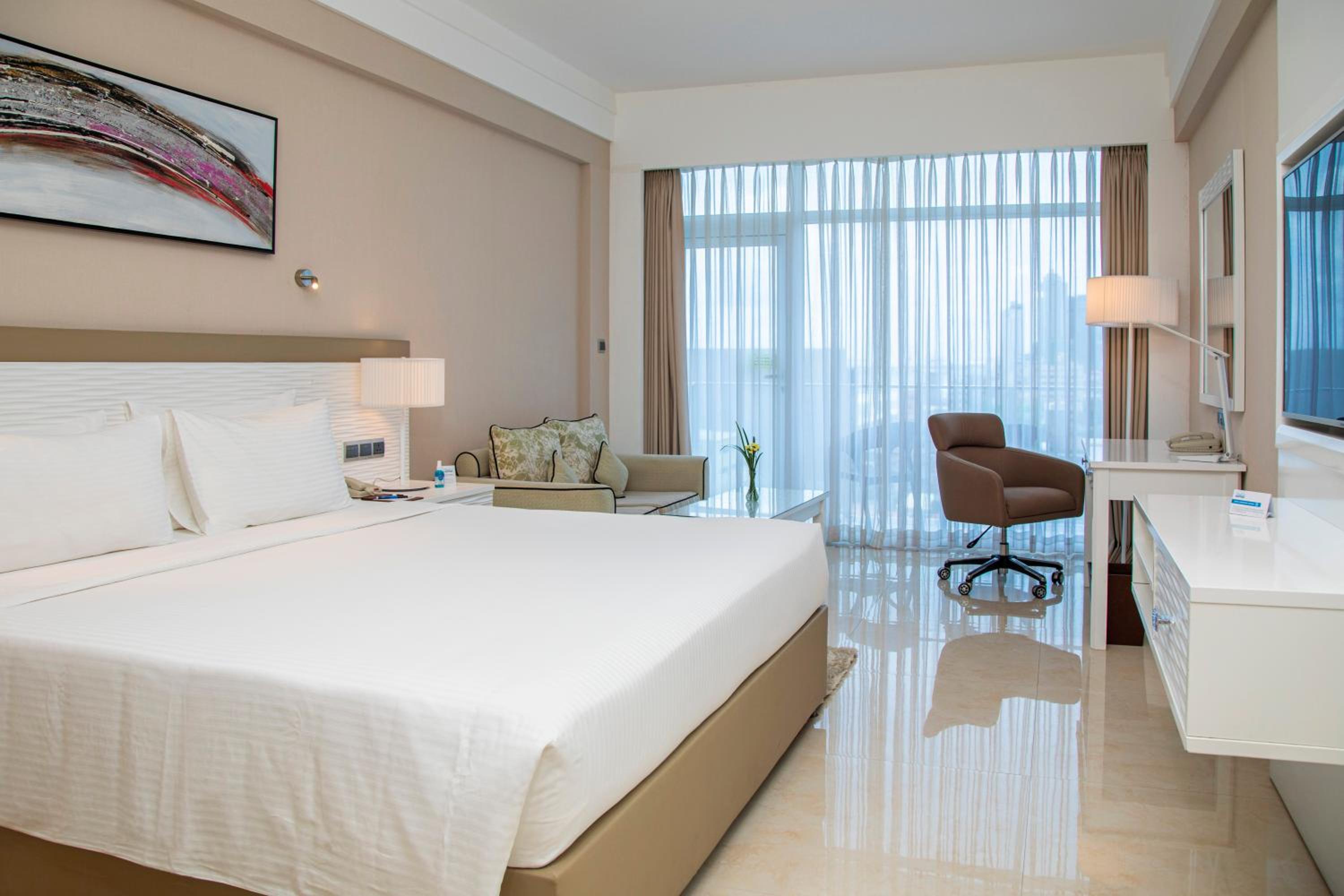 Habitación Premier King con Tour por la Ciudad de Cortesía y Acceso al Salón de Playa.