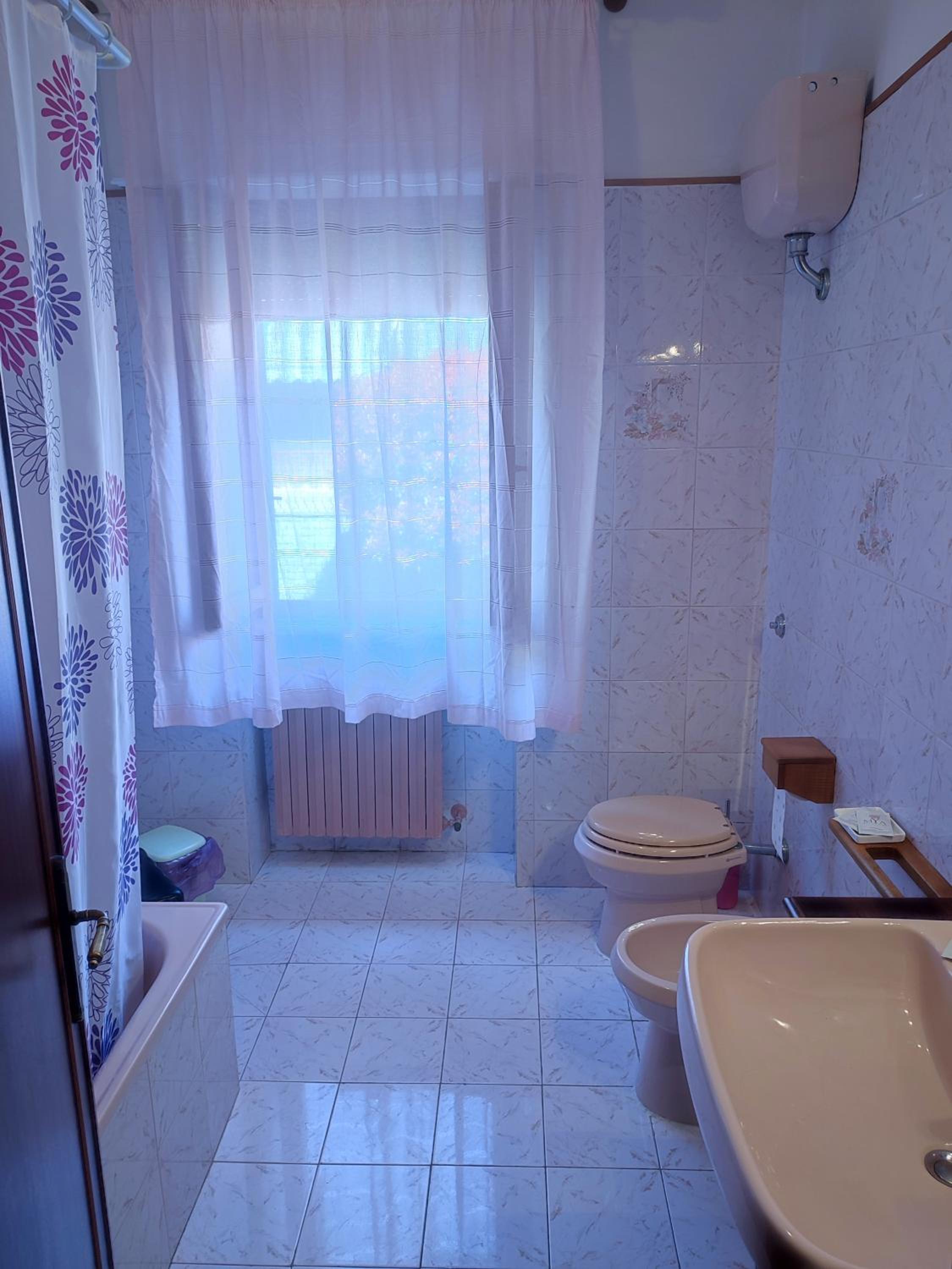 Three-Bedroom Apartment - Photo 13