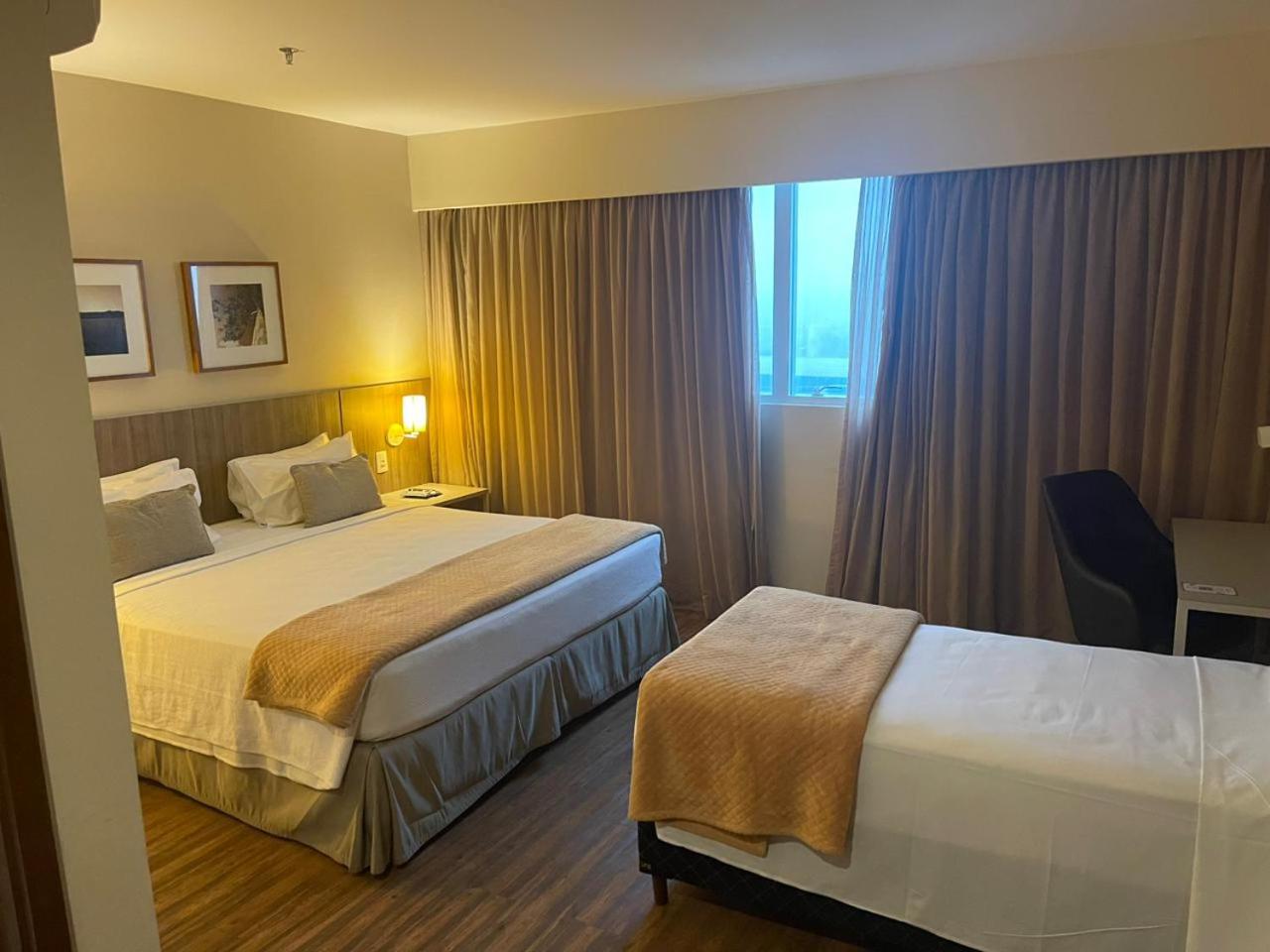 Standard Triple - 1 Queen Bed and 1 Single Bed photo 2