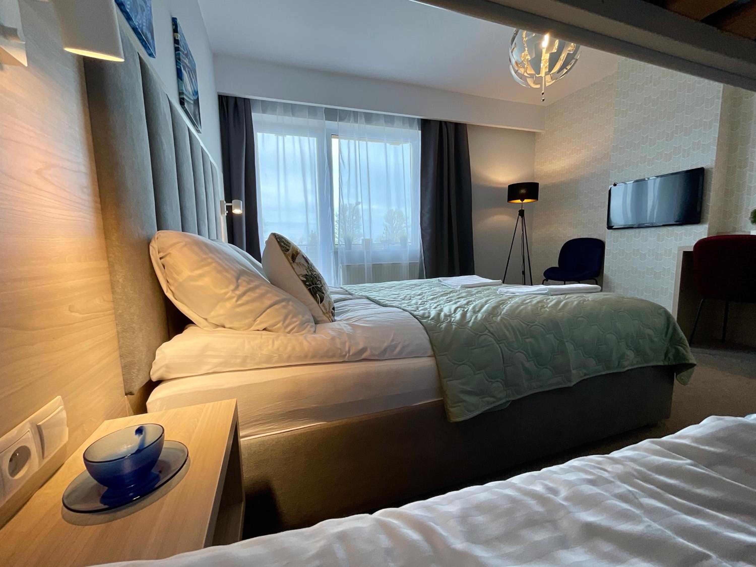 Quadruple Room with Balcony - Photo 1