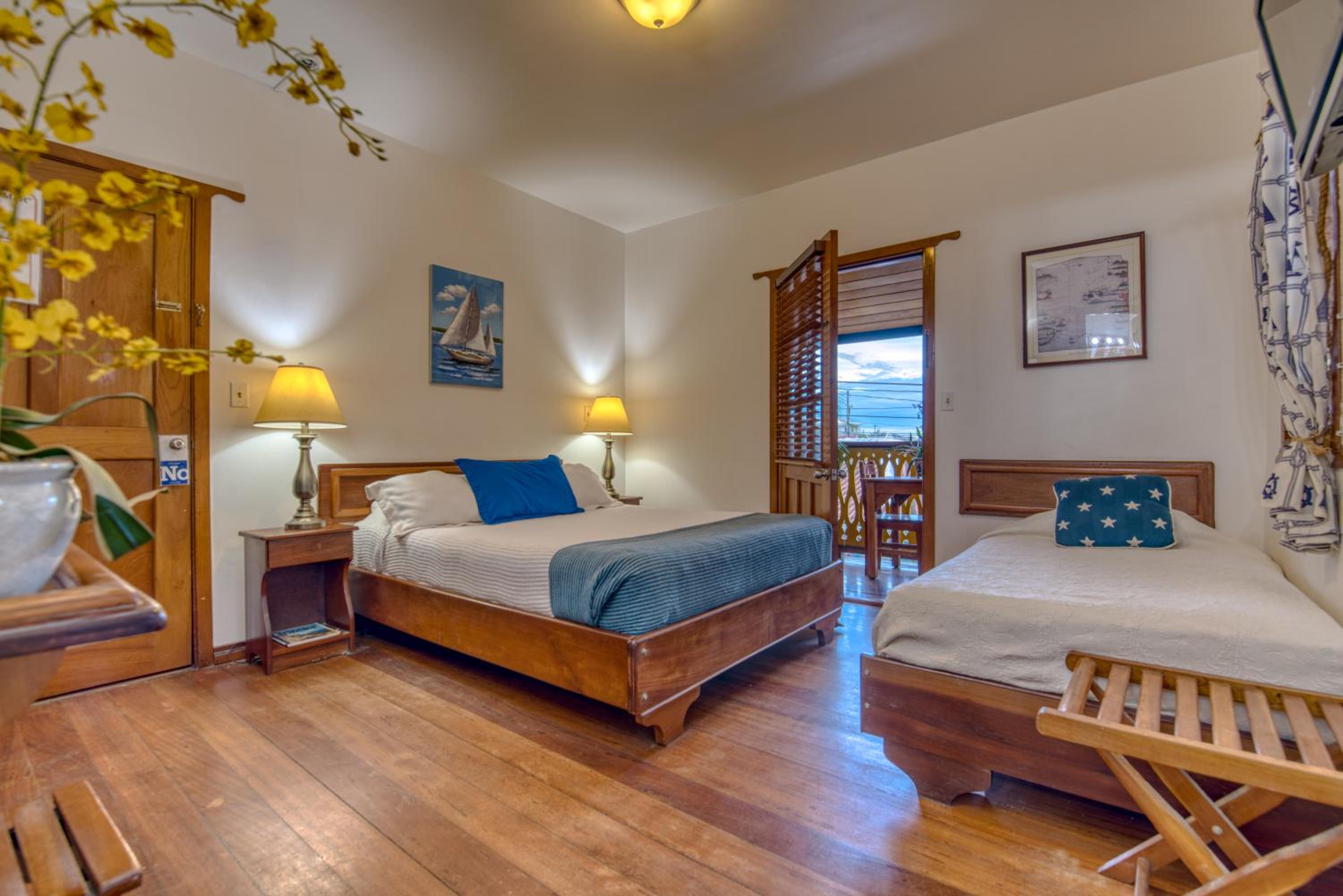 Premium Town Balcony with Queen and Single Bed photo 2