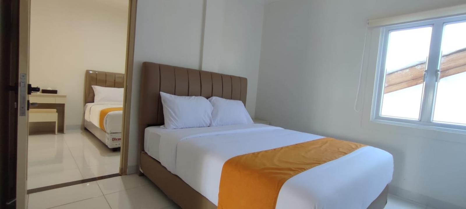Deluxe Room - Photo 7