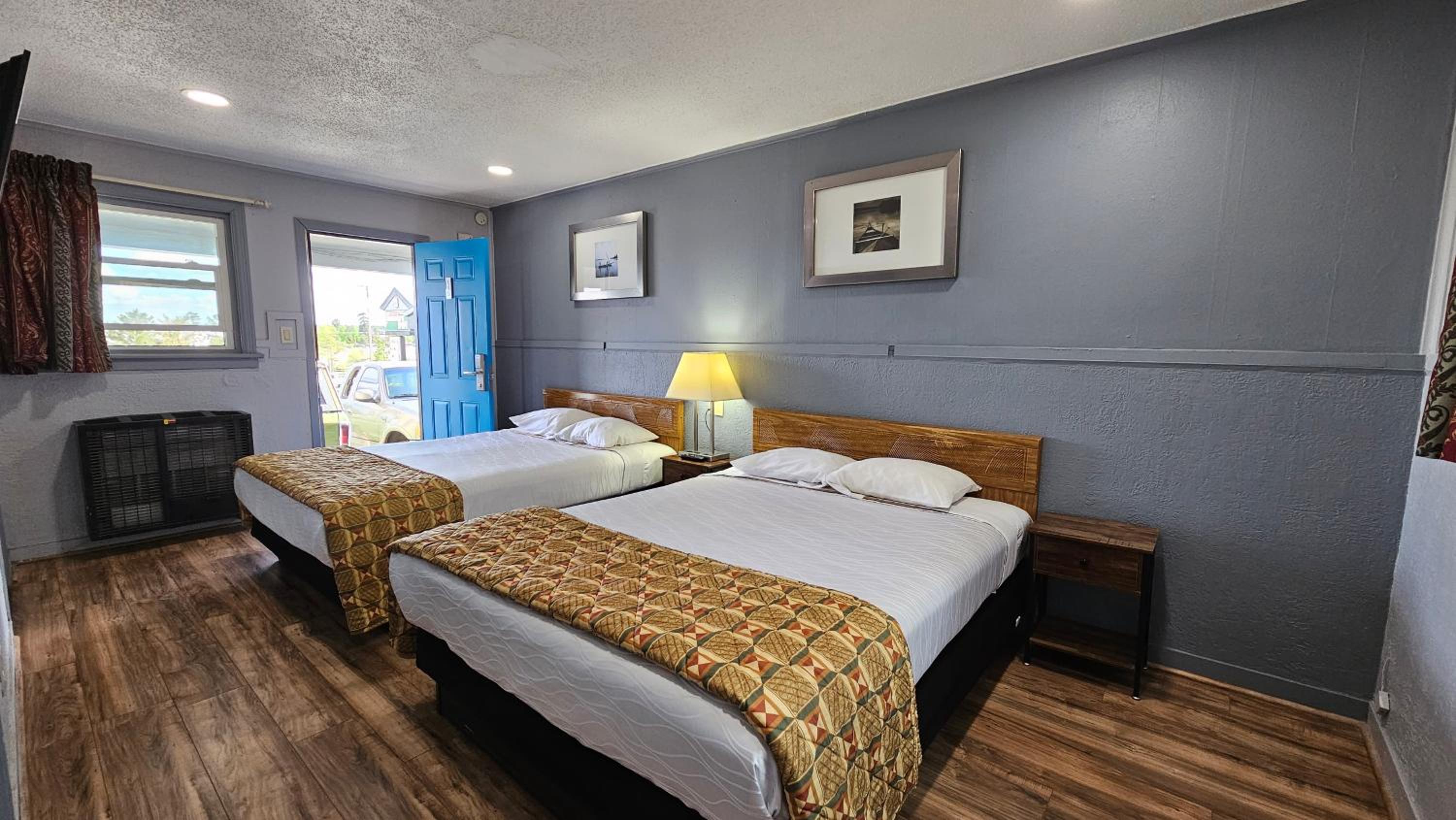 Queen Room with Two Queen Beds - Photo 1