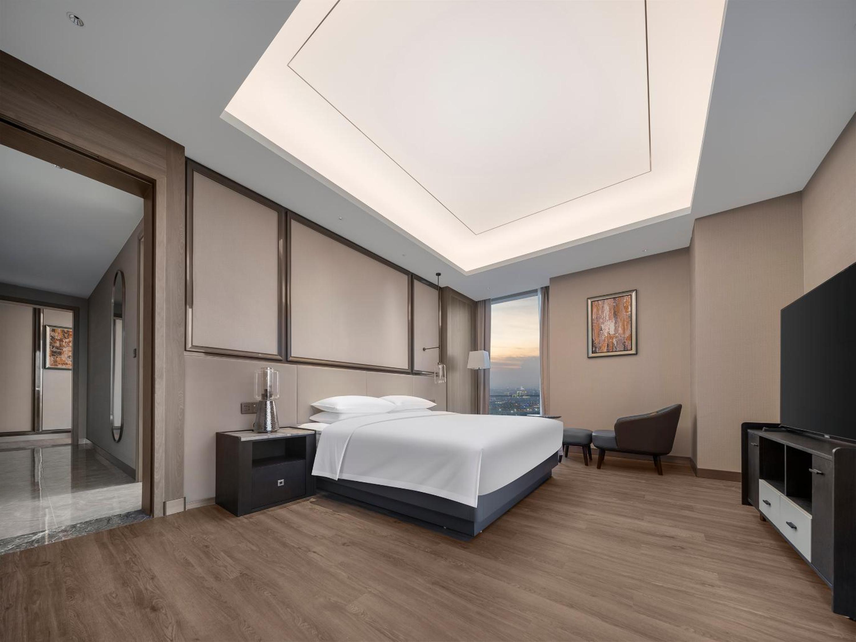 Two-Bedroom Suite with Bathtub and Living Area