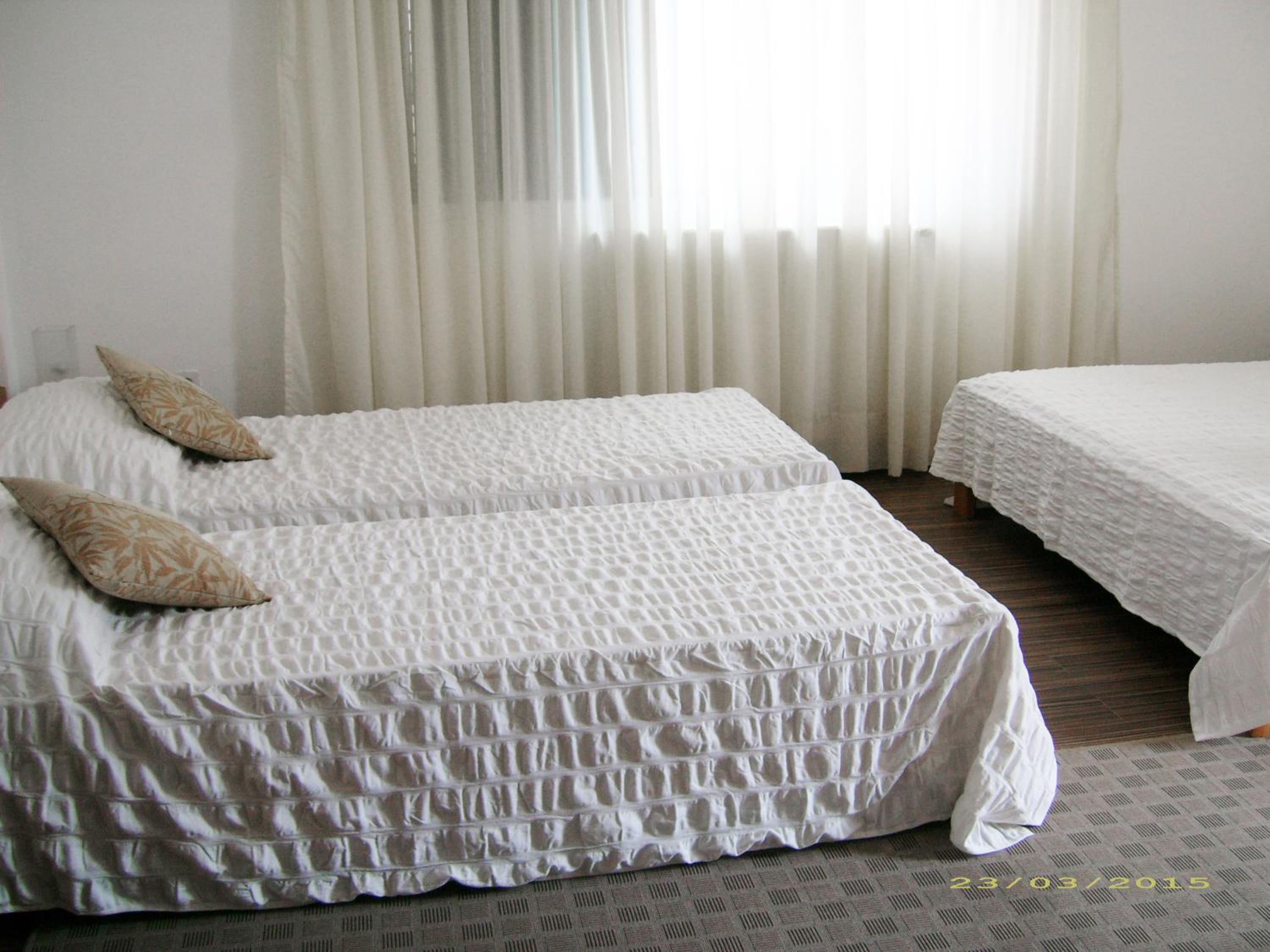 Quadruple Room with Balcony