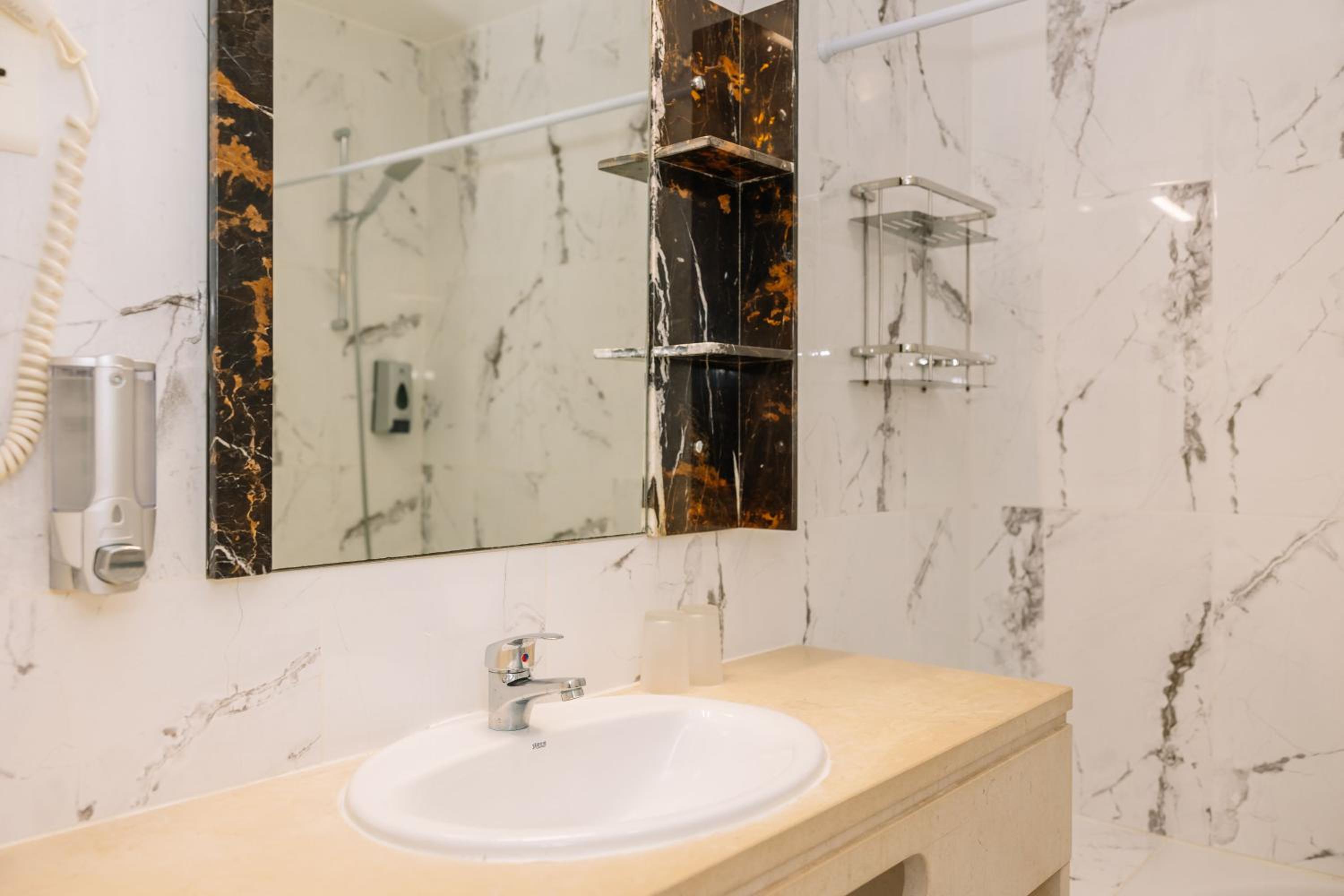 Experience luxury in this beautifully designed marble bathroom.