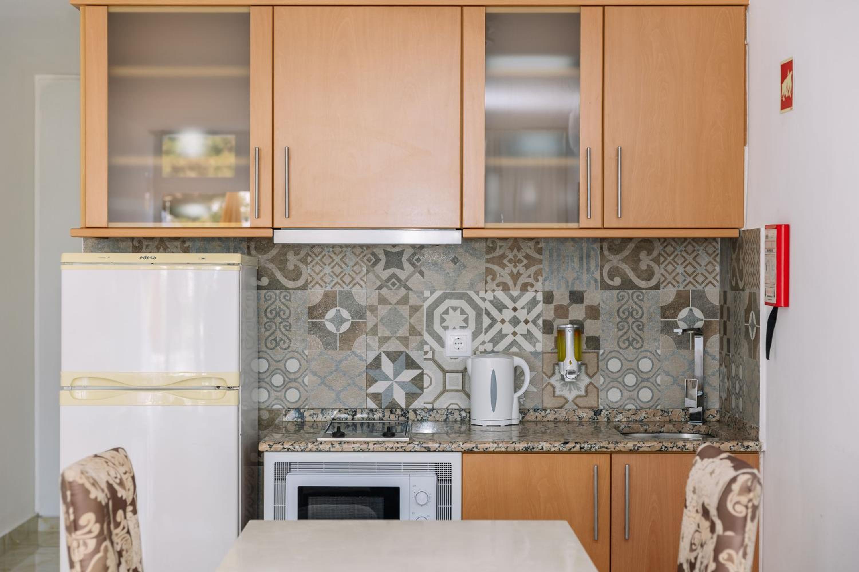 Cook up your favorite meals in this stylish kitchen!