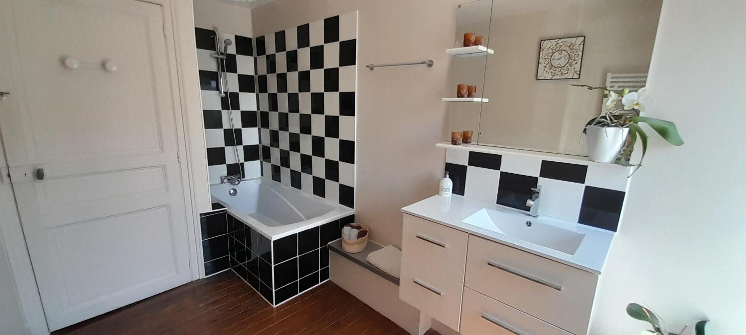Three-Bedroom House - Photo 22