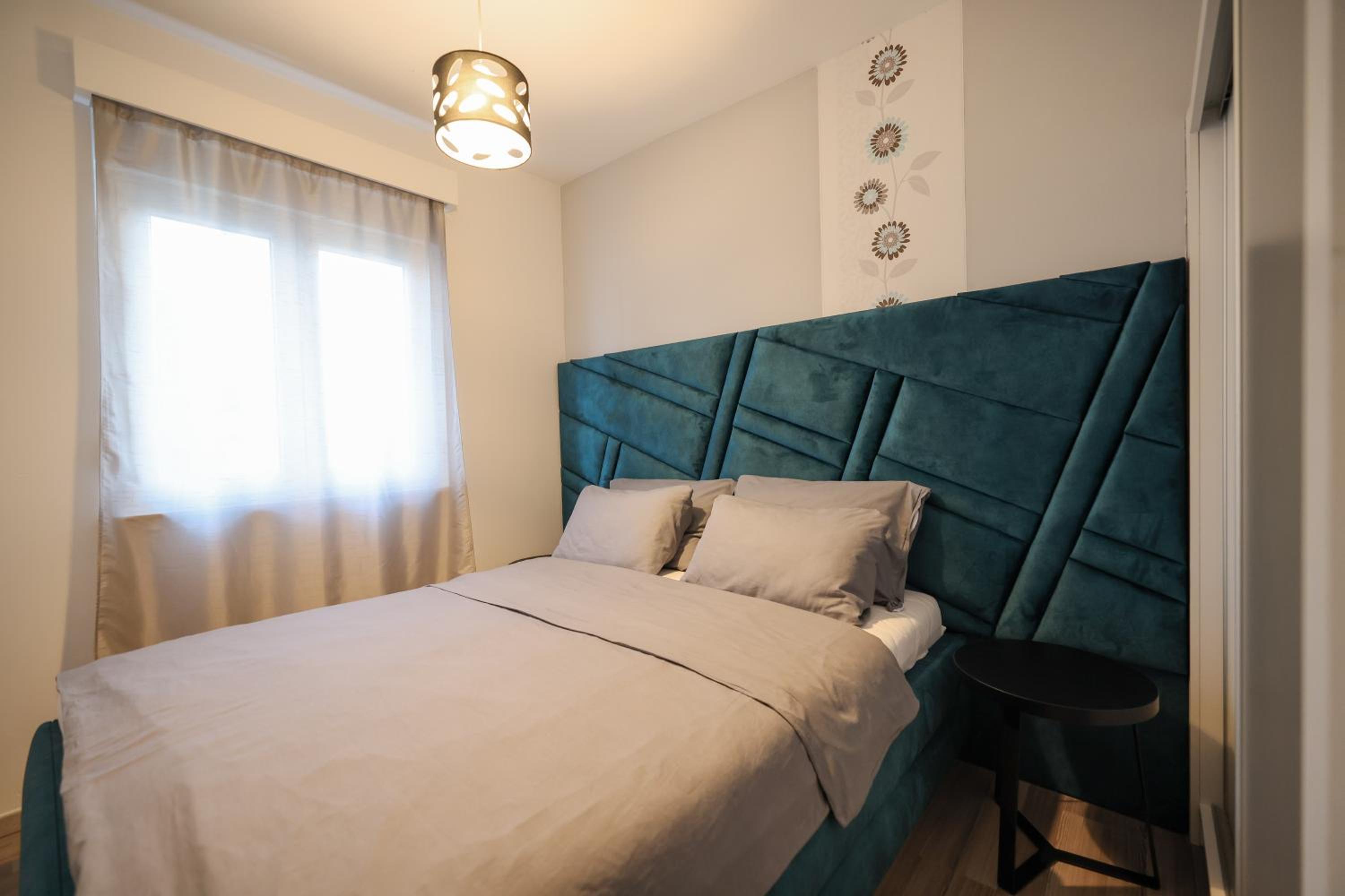 Deluxe Two-Bedroom Apartment with Balcony and Pool View photo 1