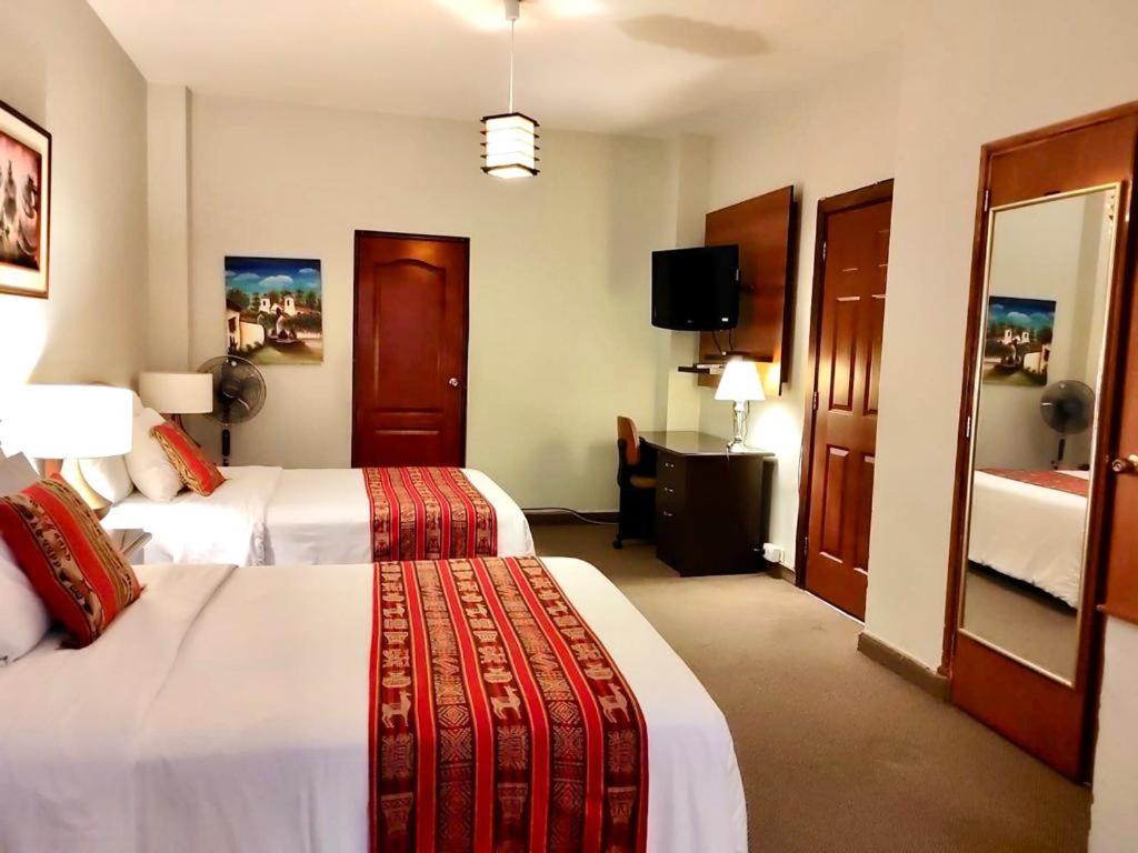 Quadruple Room - Photo 16