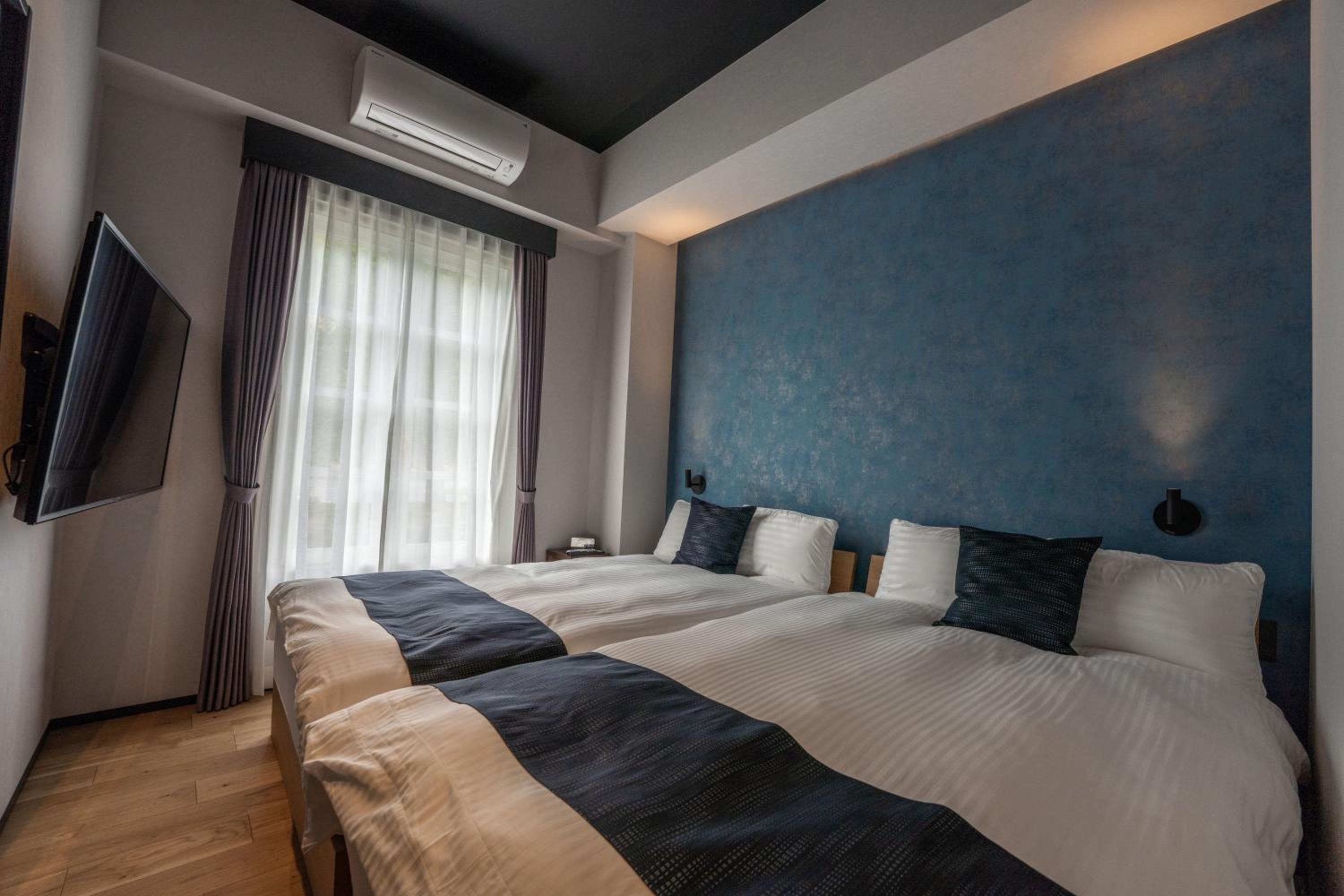 Deluxe Queen Room with Two Queen Beds (Dog-friendly) - Non-Smoking photo 3