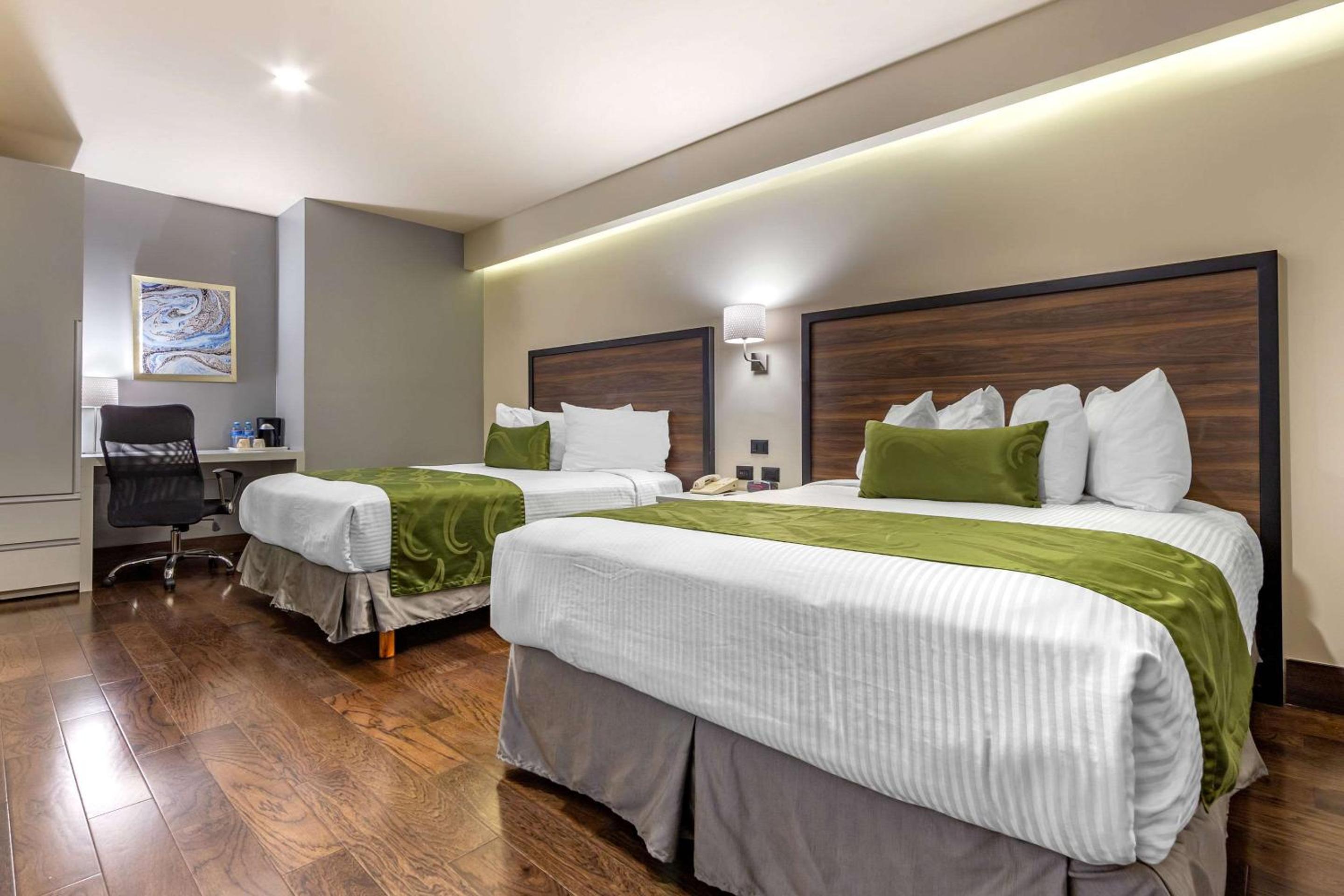 Queen Room with Two Queen Beds - Non-Smoking - Photo 1
